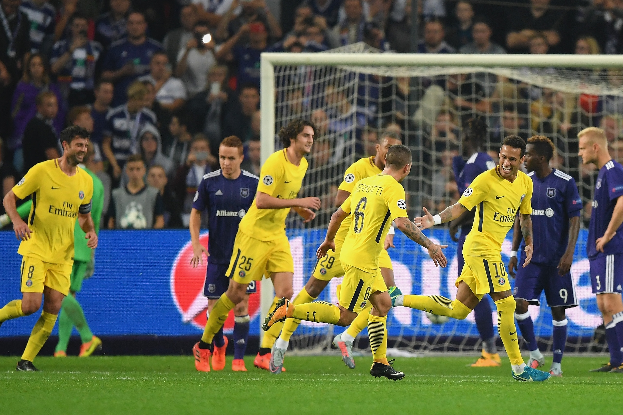 BRUSSELS, BELGIUM - OCTOBER 18: Neymar of PSG celebrates scoring his sides third goal with his PSG team mates during the UEFA Champions League group B match between RSC Anderlecht and Paris Saint-Germain at Constant Vanden Stock Stadium on October 18, 20 BRUSSELS, BELGIUM - OCTOBER 18: Neymar of PSG celebrates scoring his sides third goal with his PSG team mates during the UEFA Champions League group B match between RSC Anderlecht and Paris Saint-Germain at Constant Vanden Stock Stadium on October 18, 20