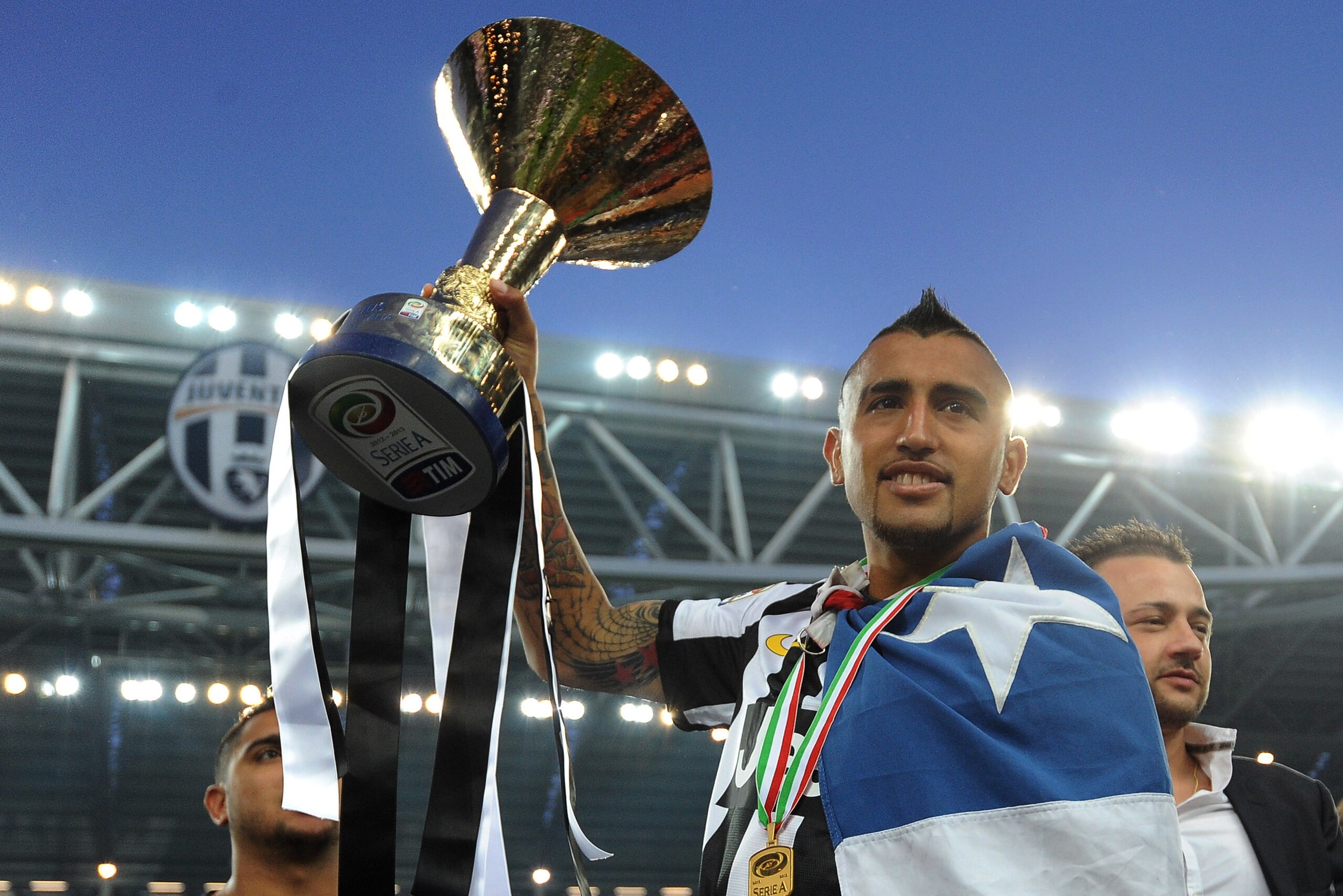 TURIN, ITALY - MAY 11:  Arturo Vidal of Juventus celebrates with the Serie A trophy at the end of the Serie A match between Juventus and Cagliari Calcio at Juventus Arena on May 11, 2013 in Turin, Italy.  (Photo by Valerio Pennicino/Getty Images)