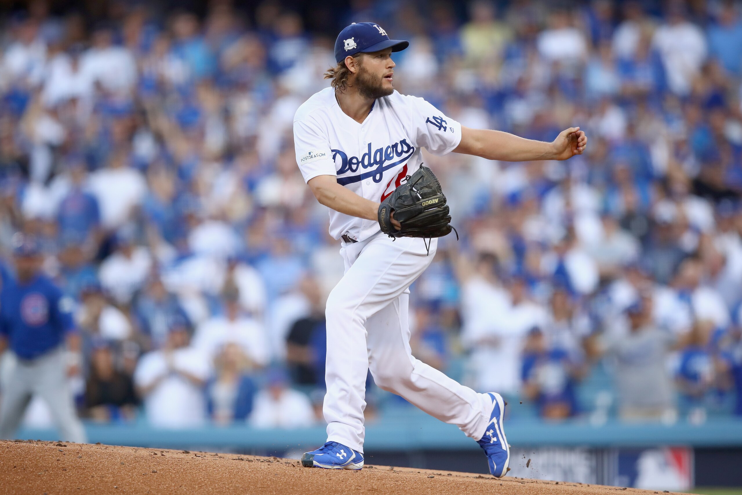 LOS ANGELES, CA - OCTOBER 14:  Clayton Kershaw #22 of the Los Angeles Dodgers pitches against the Chicago Cubs during Game One of the National League Championship Series at Dodger Stadium on October 14, 2017 in Los Angeles, California.  (Photo by Ezra Sha