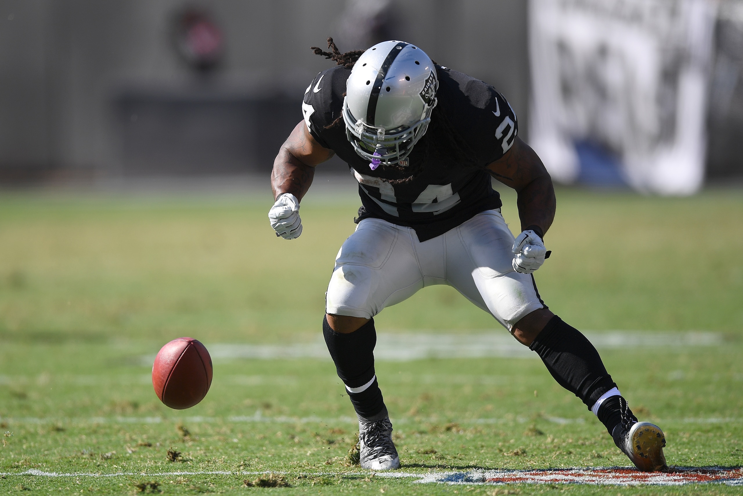 OAKLAND, CA - OCTOBER 15:  Marshawn Lynch #24 of the Oakland Raiders reacts after dropping a pass against the Los Angeles Chargers during an NFL football game at Oakland-Alameda County Coliseum on October 15, 2017 in Oakland, California.  (Photo by Thearo