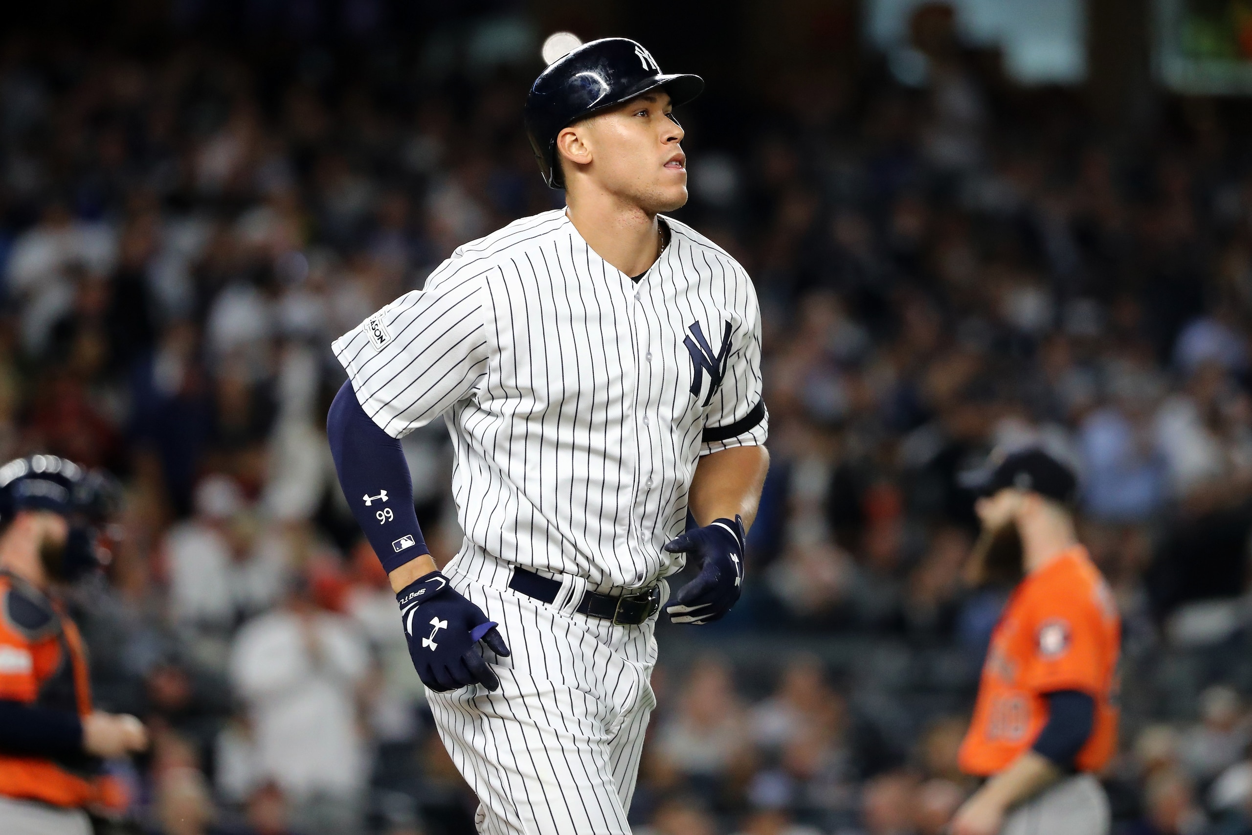 NEW YORK, NY - OCTOBER 18: Aaron Judge #99 of the New York Yankees takes first base after a walk during the fifth inning against the Houston Astros in Game Five of the American League Championship Series at Yankee Stadium on October 18, 2017 in the Bronx NEW YORK, NY - OCTOBER 18: Aaron Judge #99 of the New York Yankees takes first base after a walk during the fifth inning against the Houston Astros in Game Five of the American League Championship Series at Yankee Stadium on October 18, 2017 in the Bronx