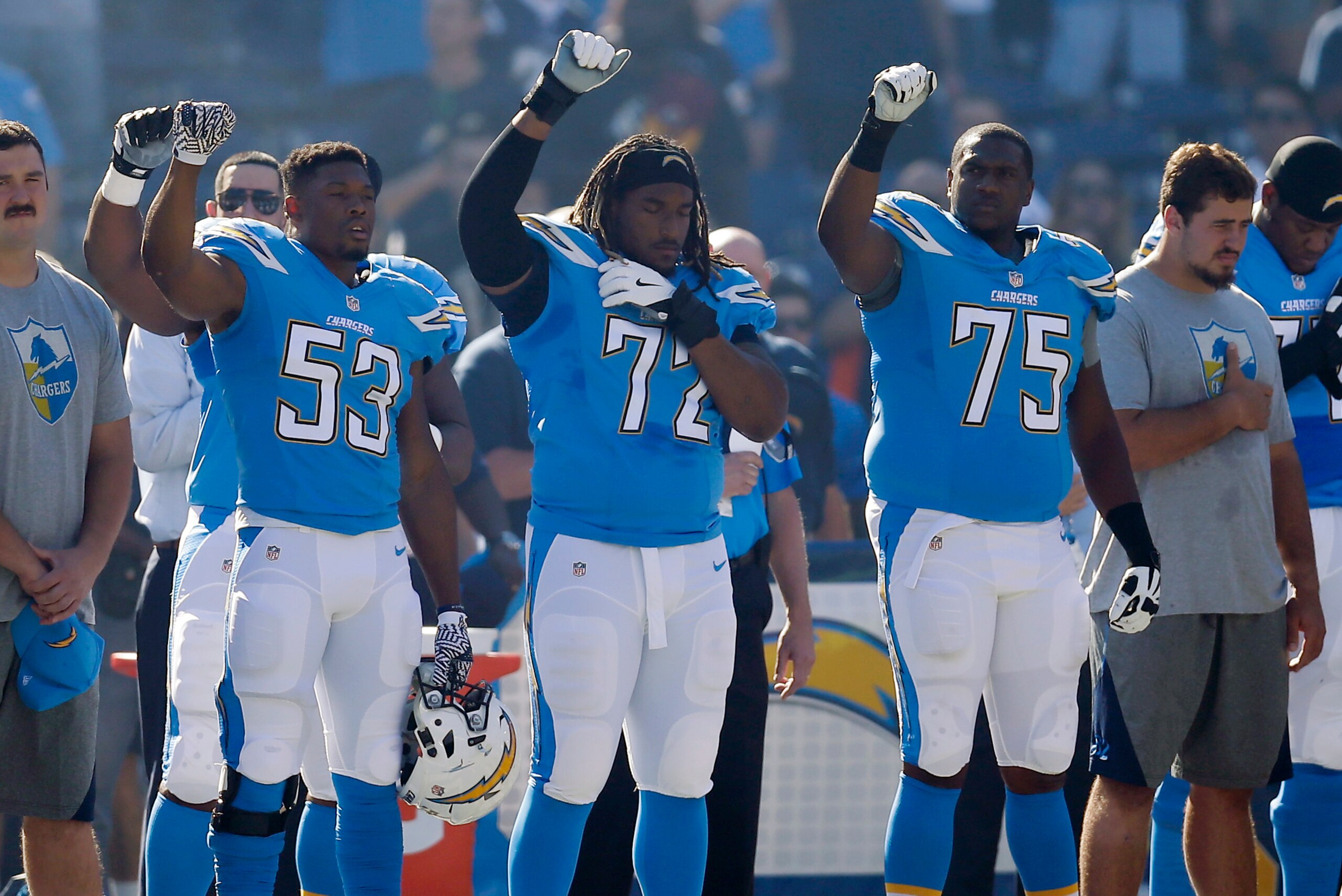 Perry (No. 53) raising a fist on the sideline while with the Chargers in 2016. Perry (No. 53) raising a fist on the sideline while with the Chargers in 2016.