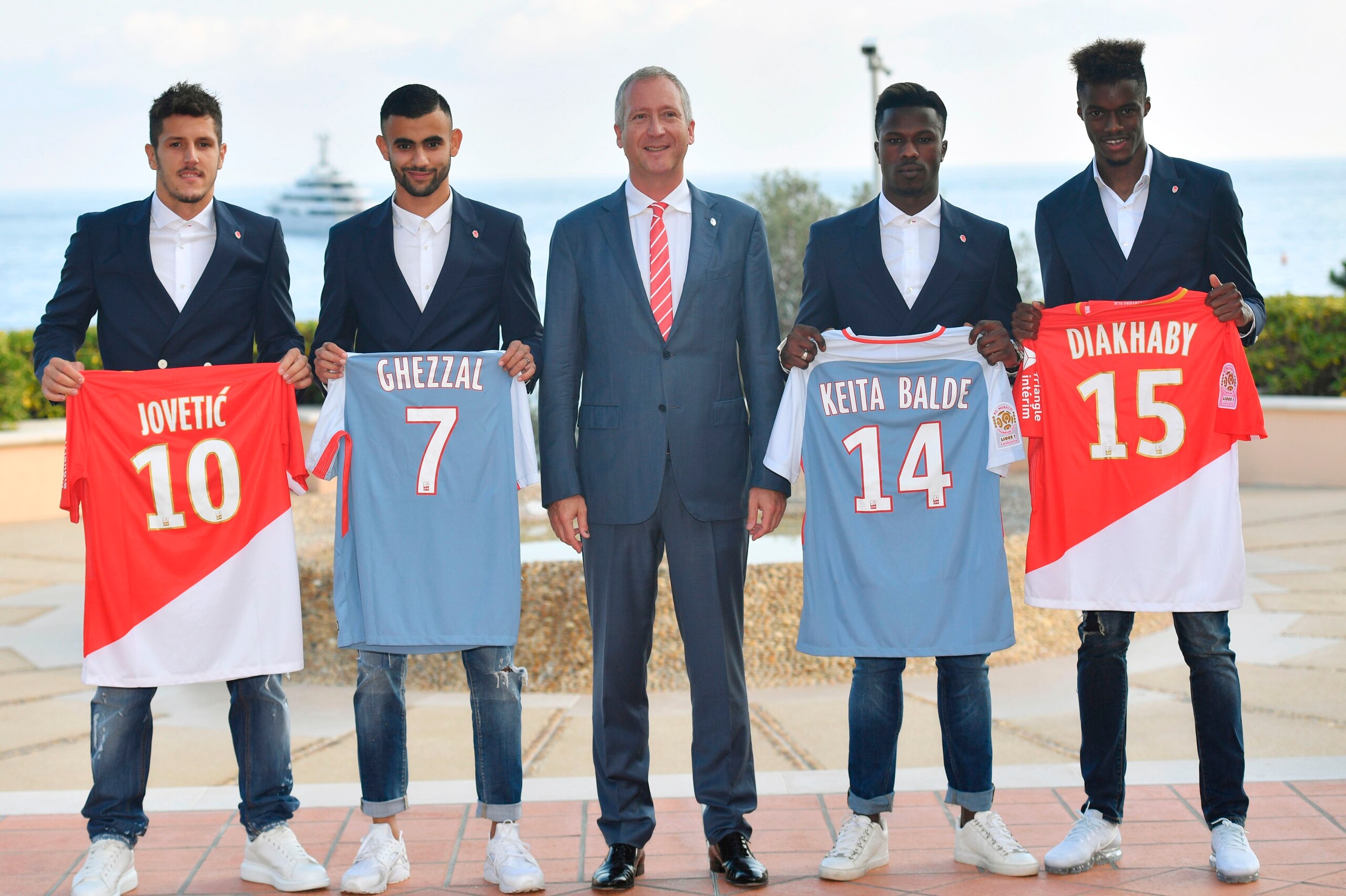 AS Monaco football club's Russian Vice-President Vadim Vasilyev (C) poses with newly recruited (L-R) Yugoslavian forward Stevan Jovetic, French midfielder Rachid Ghezzal, Spanish forward Keita Balde and and French forward Adama Diakhaby on September 7, 20