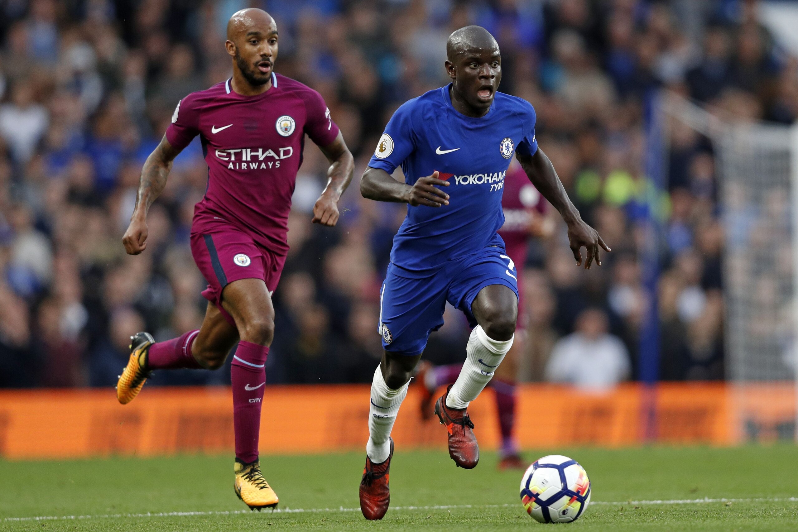 Chelsea's French midfielder N'Golo Kante (R) runs away from Manchester City's English midfielder Fabian Delph during the English Premier League football match between Chelsea and Manchester City at Stamford Bridge in London on September 30, 2017. / AFP PH Chelsea's French midfielder N'Golo Kante (R) runs away from Manchester City's English midfielder Fabian Delph during the English Premier League football match between Chelsea and Manchester City at Stamford Bridge in London on September 30, 2017. / AFP PH