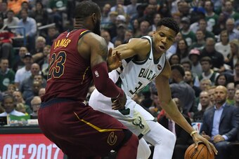 MILWAUKEE, WI - OCTOBER 20:  Giannis Antetokounmpo #34 of the Milwaukee Bucks works against LeBron James #23 of the Cleveland Cavaliers during the first quarter of a game at the Bradley Center on October 20, 2017 in Milwaukee, Wisconsin. NOTE TO USER: Use