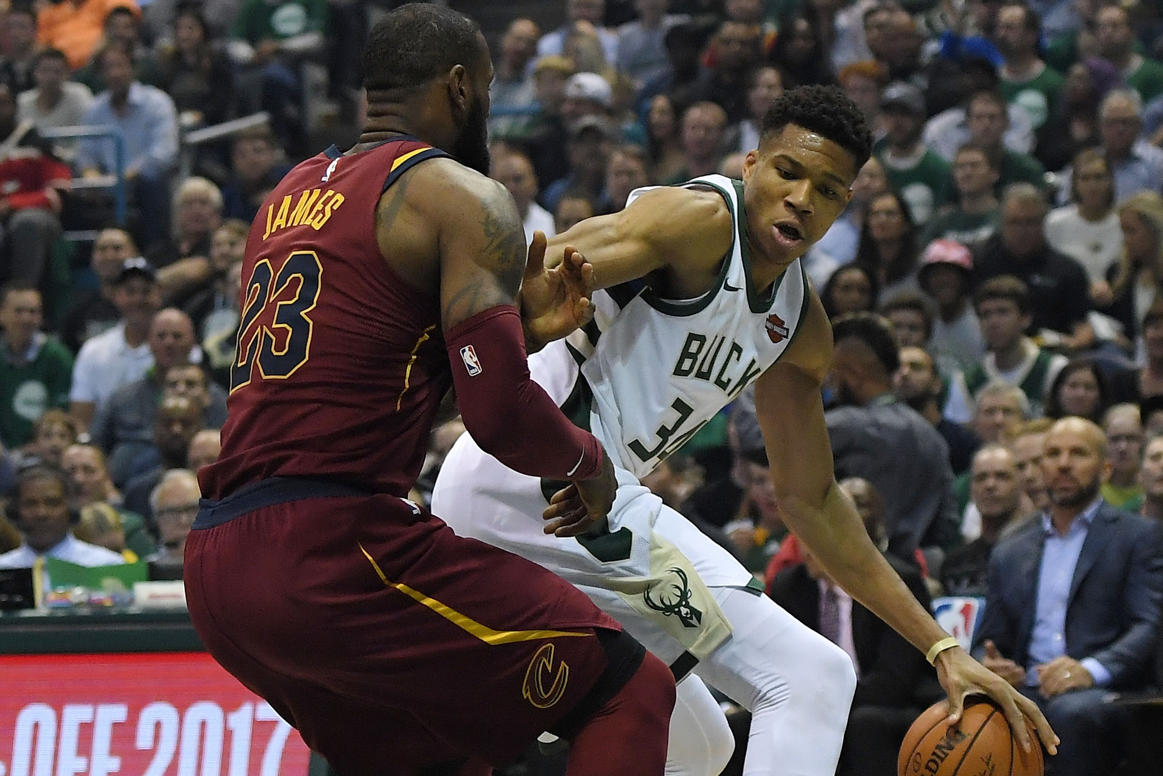 MILWAUKEE, WI - OCTOBER 20: Giannis Antetokounmpo #34 of the Milwaukee Bucks works against LeBron James #23 of the Cleveland Cavaliers during the first quarter of a game at the Bradley Center on October 20, 2017 in Milwaukee, Wisconsin. NOTE TO USER: Use MILWAUKEE, WI - OCTOBER 20: Giannis Antetokounmpo #34 of the Milwaukee Bucks works against LeBron James #23 of the Cleveland Cavaliers during the first quarter of a game at the Bradley Center on October 20, 2017 in Milwaukee, Wisconsin. NOTE TO USER: Use