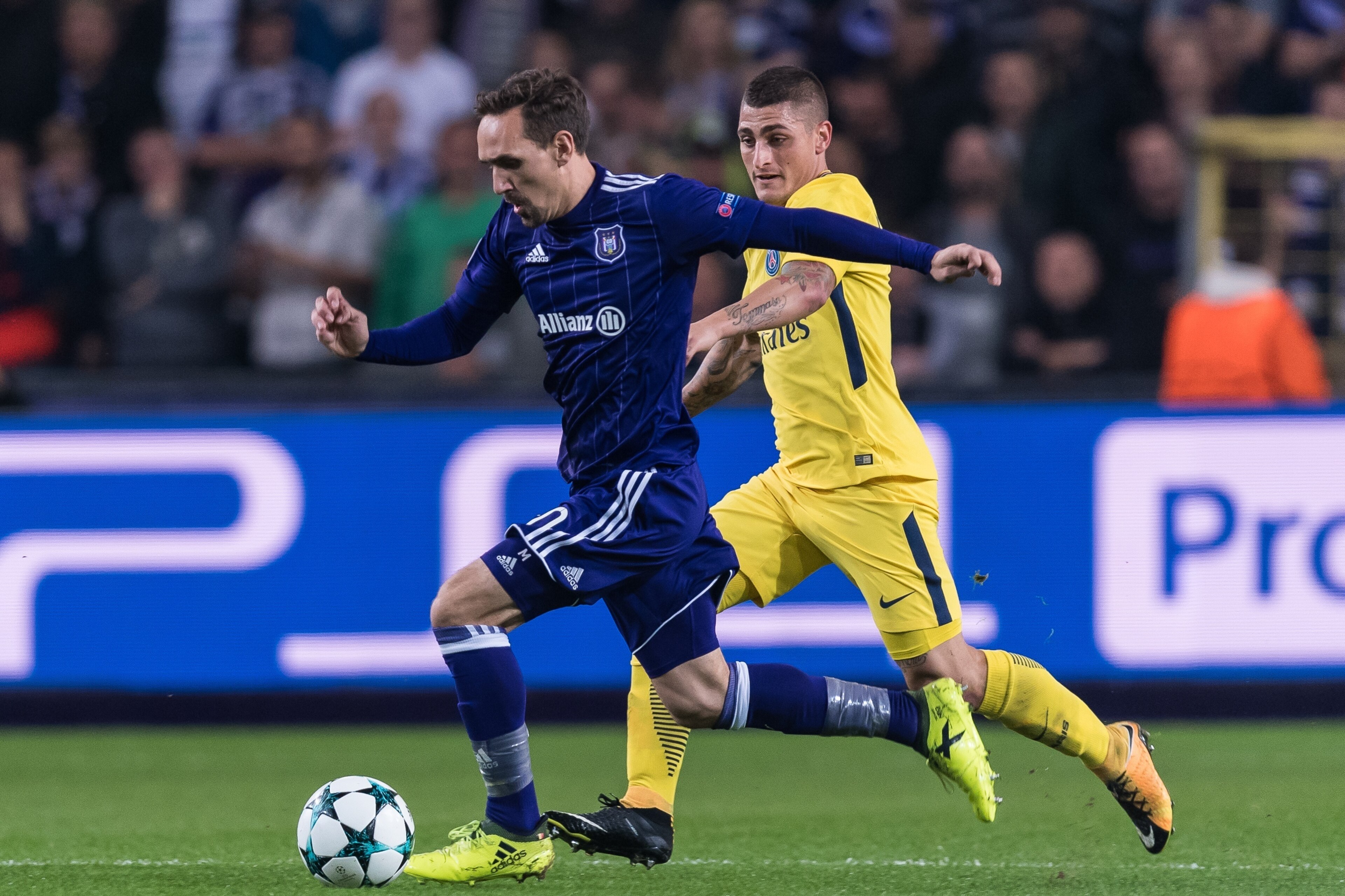(L-R) Sven Kums of RSC Anderlecht, Marco Verratti of Paris Saint-Germain during the UEFA Champions League group B match between RSC Anderlecht and Paris Saint Germain on October 18, 2017 at Constant Vanden Stock Stadium in Brussels, Belgium.(Photo by VI I
