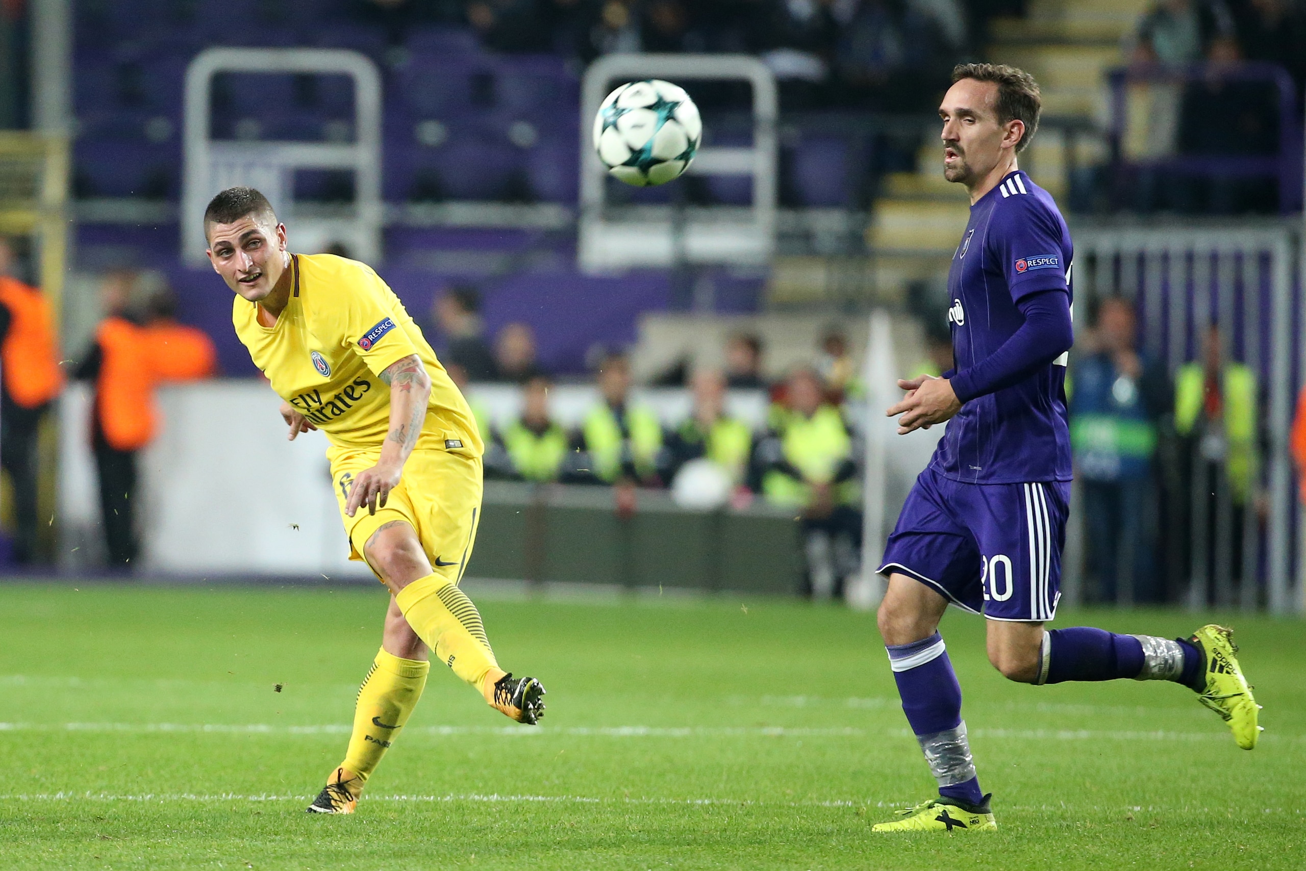 BRUSSELS, BELGIUM - OCTOBER 18: Marco Verratti of PSG, Sven Kums of Anderlecht during the UEFA Champions League match between RSC Anderlecht and Paris Saint Germain (PSG) at Constant Vanden Stock Stadium on October 18, 2017 in Anderlecht, Brussels, Belgiu