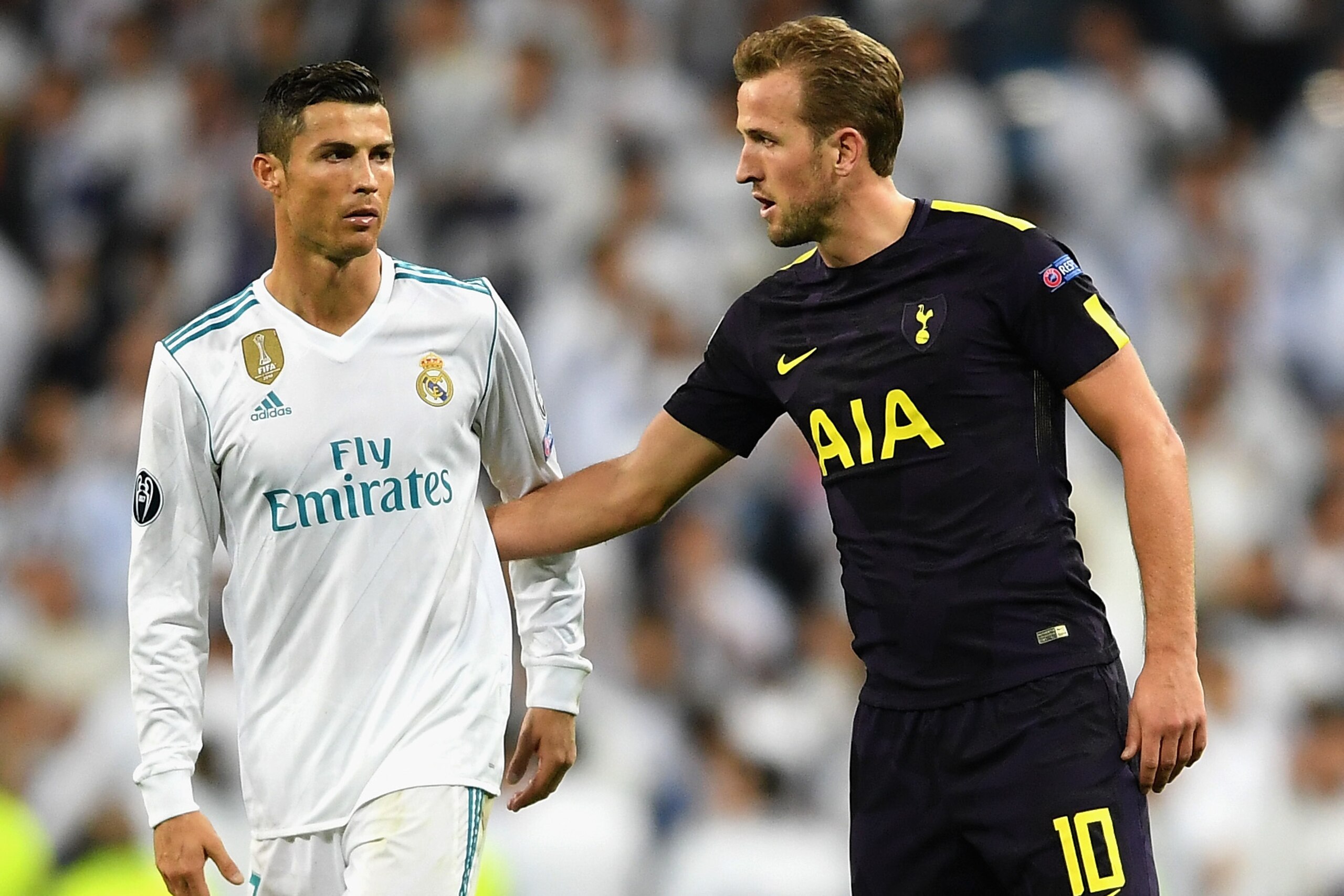 MADRID, SPAIN - OCTOBER 17:  Cristiano Ronaldo of Real Madrid and Harry Kane of Tottenham Hotspur speak after the UEFA Champions League group H match between Real Madrid and Tottenham Hotspur at Estadio Santiago Bernabeu on October 17, 2017 in Madrid, Spa