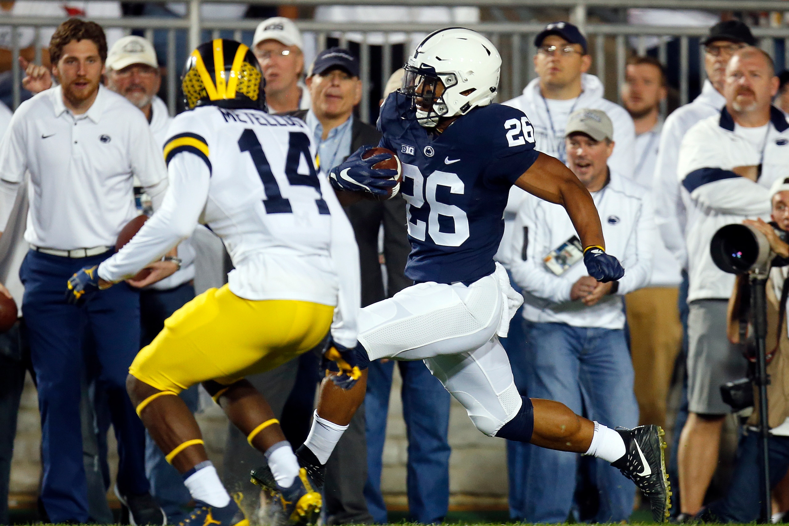 STATE COLLEGE, PA - OCTOBER 21:  Saquon Barkley #26 of the Penn State Nittany Lions rushes for a 15 yard touchdown in the first half against the Michigan Wolverines on October 21, 2017 at Beaver Stadium in State College, Pennsylvania.  (Photo by Justin K.
