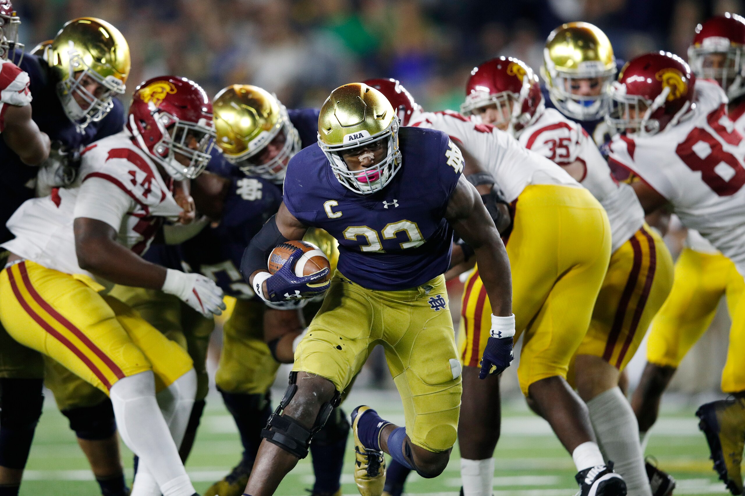 SOUTH BEND, IN - OCTOBER 21: Josh Adams #33 of the Notre Dame Fighting Irish runs for a 14-yard touchdown in the fourth quarter of a game against the USC Trojans at Notre Dame Stadium on October 21, 2017 in South Bend, Indiana. Notre Dame won 49-14. (Phot