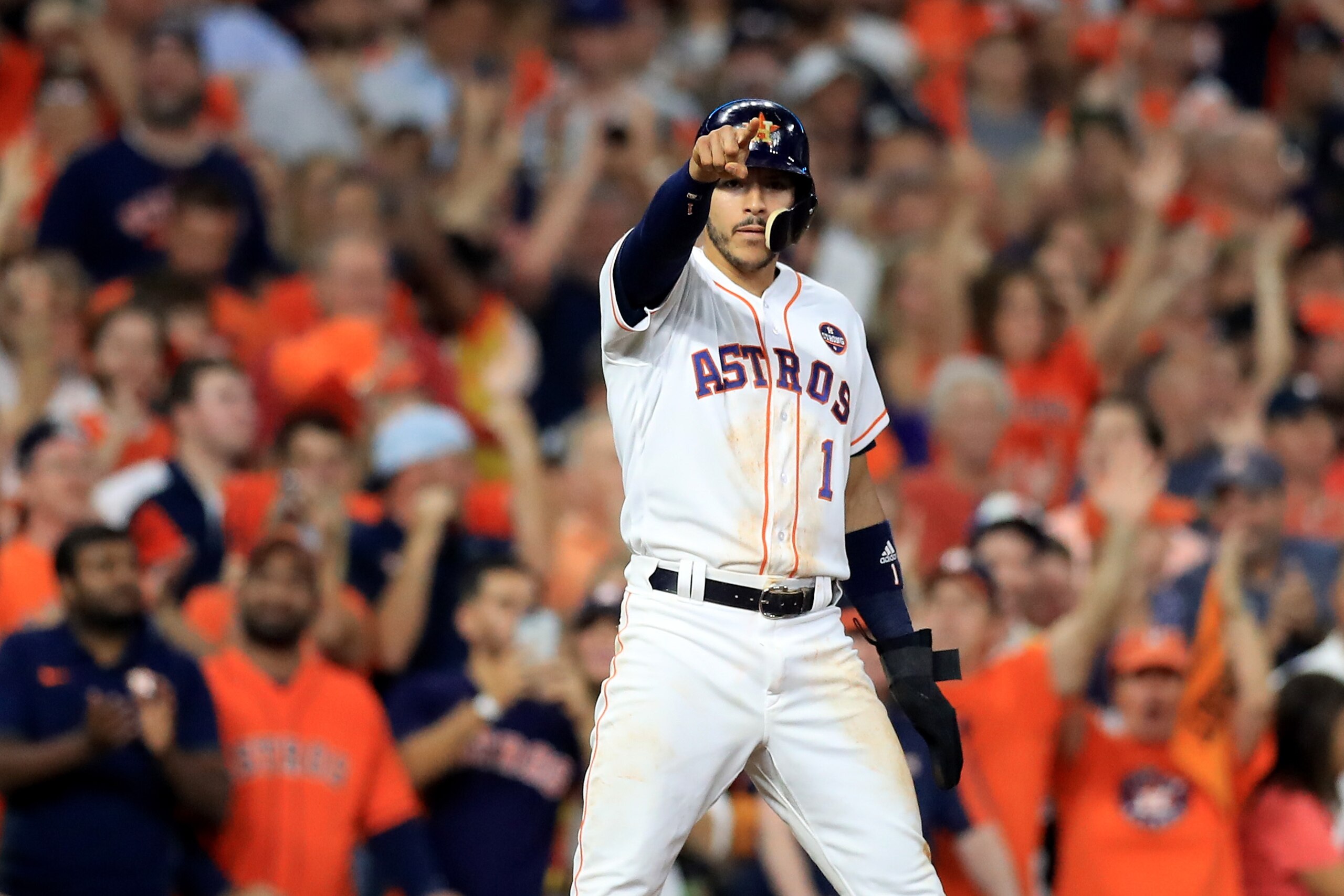 HOUSTON, TX - OCTOBER 21: Carlos Correa #1 of the Houston Astros reacts after Yuli Gurriel #10 hit a single against Tommy Kahnle #48 of the New York Yankees during the fifth inning in Game Seven of the American League Championship Series at Minute Maid P HOUSTON, TX - OCTOBER 21: Carlos Correa #1 of the Houston Astros reacts after Yuli Gurriel #10 hit a single against Tommy Kahnle #48 of the New York Yankees during the fifth inning in Game Seven of the American League Championship Series at Minute Maid P