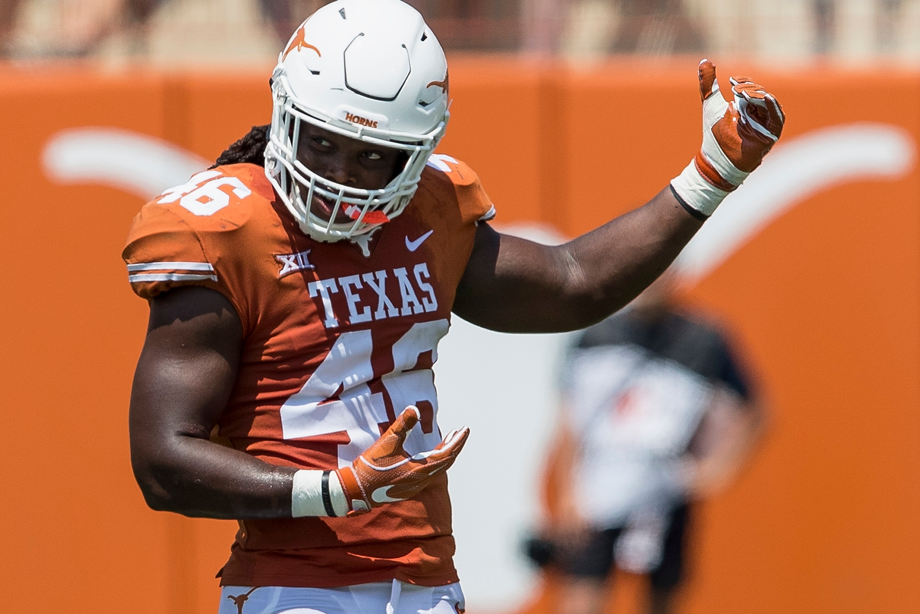 AUSTIN, TX - SEPTEMBER 02:  Malik Jefferson #46 of the Texas Longhorns reacts after a tackle in the third quarter against the Maryland Terrapins at Darrell K Royal-Texas Memorial Stadium on September 2, 2017 in Austin, Texas.  (Photo by Tim Warner/Getty I