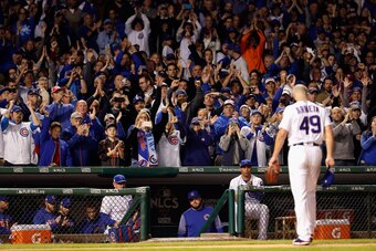 CHICAGO, IL - OCTOBER 18:  Jake Arrieta #49 of the Chicago Cubs receives a standing ovation after being relieved in the seventh inning against the Los Angeles Dodgers during game four of the National League Championship Series at Wrigley Field on October 