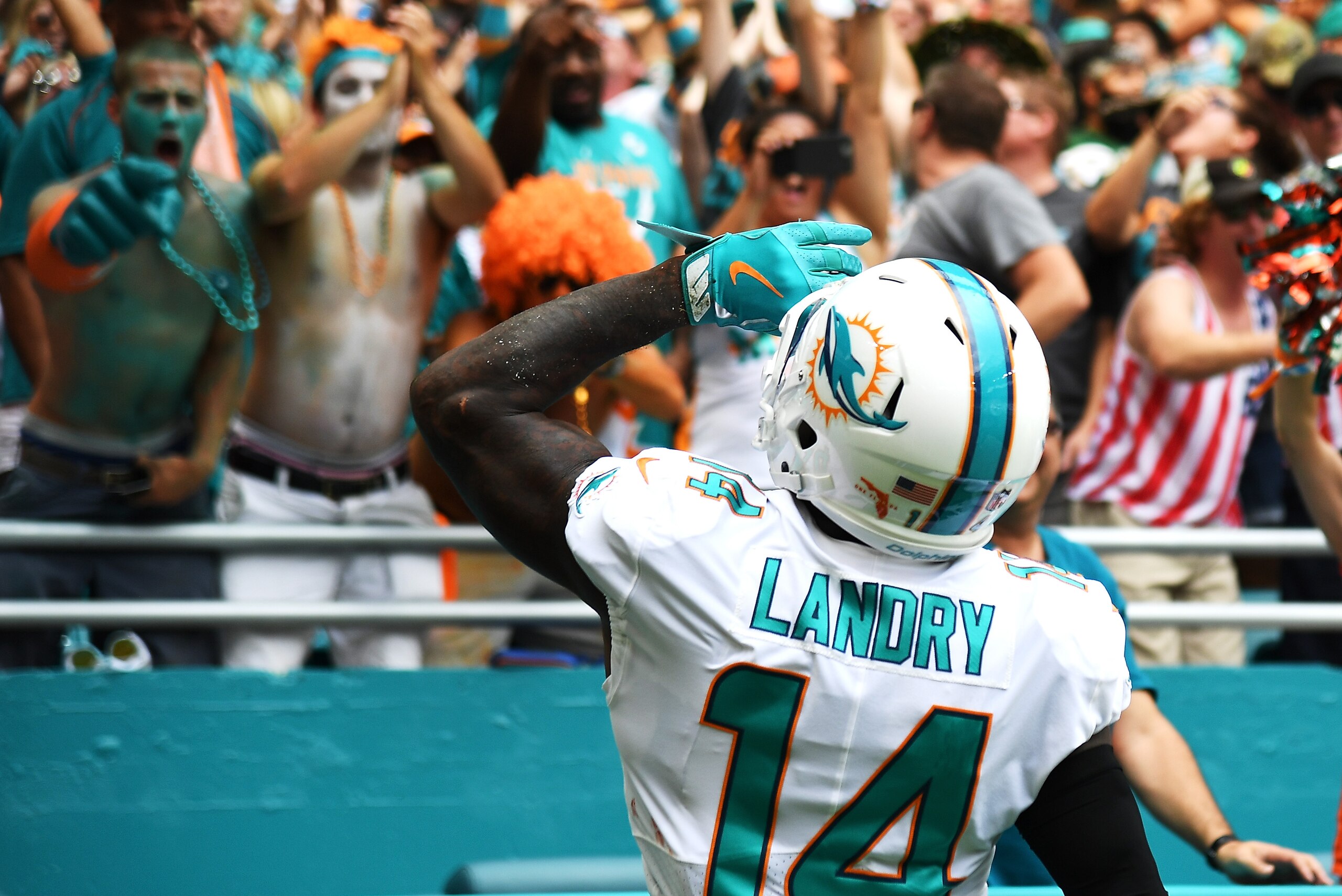 MIAMI GARDENS, FL - OCTOBER 22: Jarvis Landry #14 of the Miami Dolphins celebrates after scoring a touchdown during a game against the New York Jets at Hard Rock Stadium on October 22, 2017 in Miami Gardens, Florida. (Photo by Rob Foldy/Getty Images)