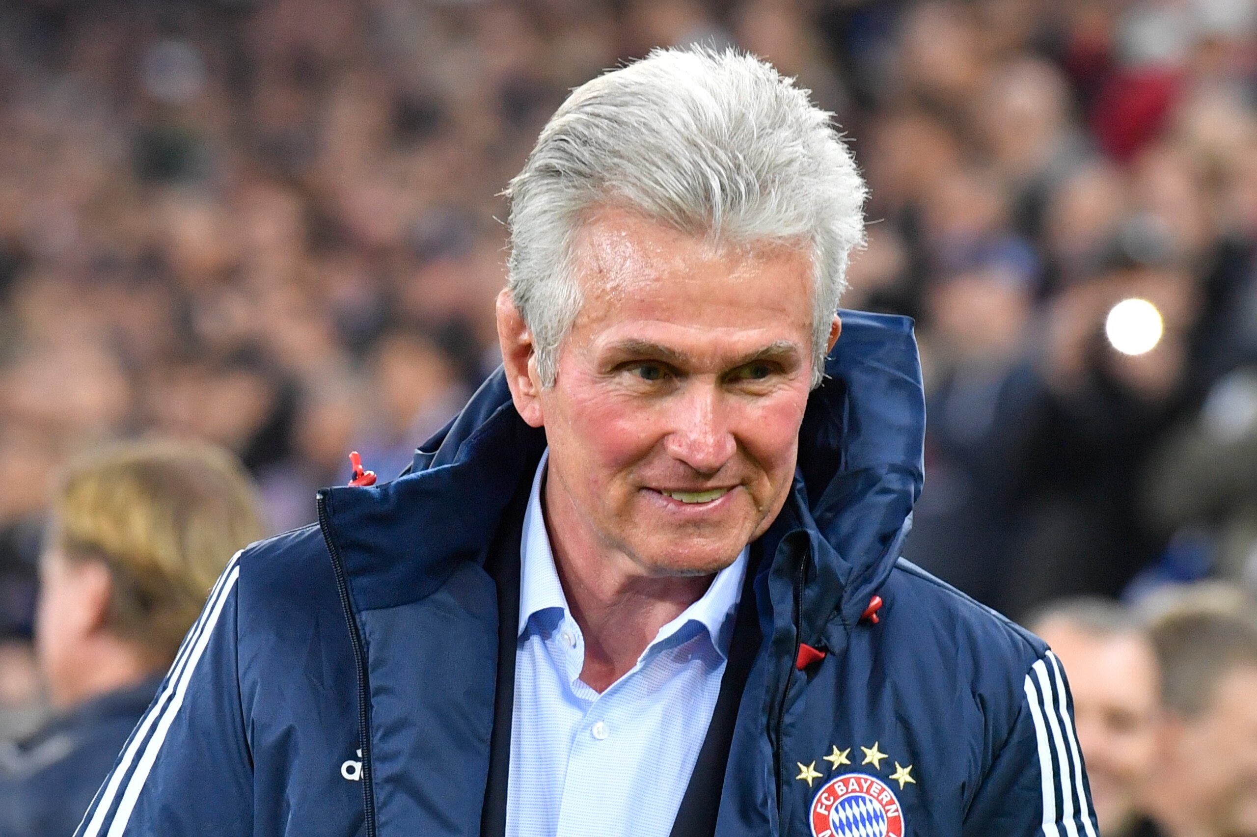 Bayern Munich's German head coach Jupp Heynckes walks onto the pitch before the start of the German first division Bundesliga football match between Hamburg SV and FC Bayern Munich in Hamburg, northern Germany, on October 21, 2017. / AFP PHOTO / John MACD