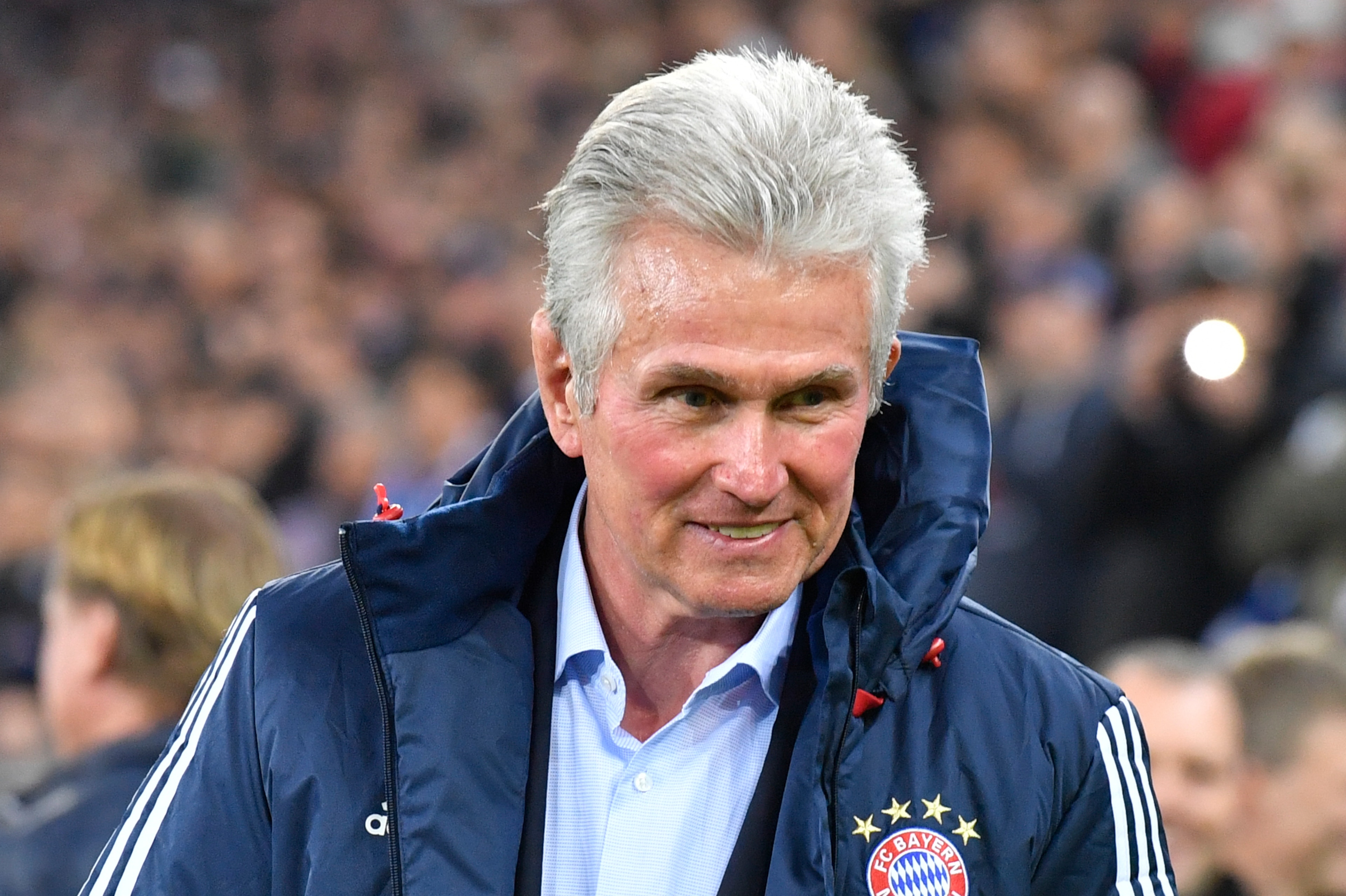 Bayern Munich's German head coach Jupp Heynckes walks onto the pitch before the start of the German first division Bundesliga football match between Hamburg SV and FC Bayern Munich in Hamburg, northern Germany, on October 21, 2017. / AFP PHOTO / John MACD