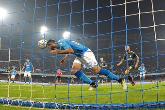 NAPLES, ITALY - OCTOBER 21:  SSC Napoli player Raul Albiol makes a save during the Serie A match between SSC Napoli and FC Internazionale at Stadio San Paolo on October 21, 2017 in Naples, Italy.  (Photo by Francesco Pecoraro/Getty Images)