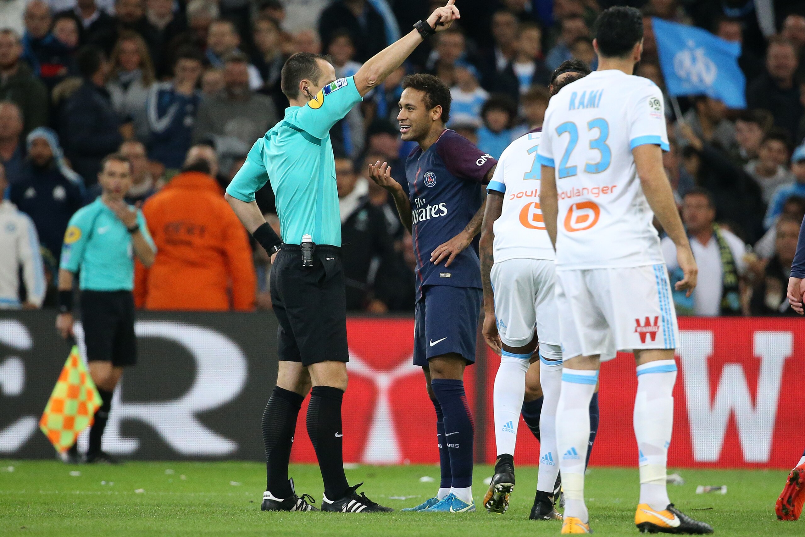 MARSEILLE, FRANCE - OCTOBER 22: Neymar Jr of PSG argues with referee Ruddy Buquet during the French Ligue 1 match between Olympique de Marseille (OM) and Paris Saint Germain (PSG) at Stade Velodrome on October 22, 2017 in Marseille, France. (Photo by Jean