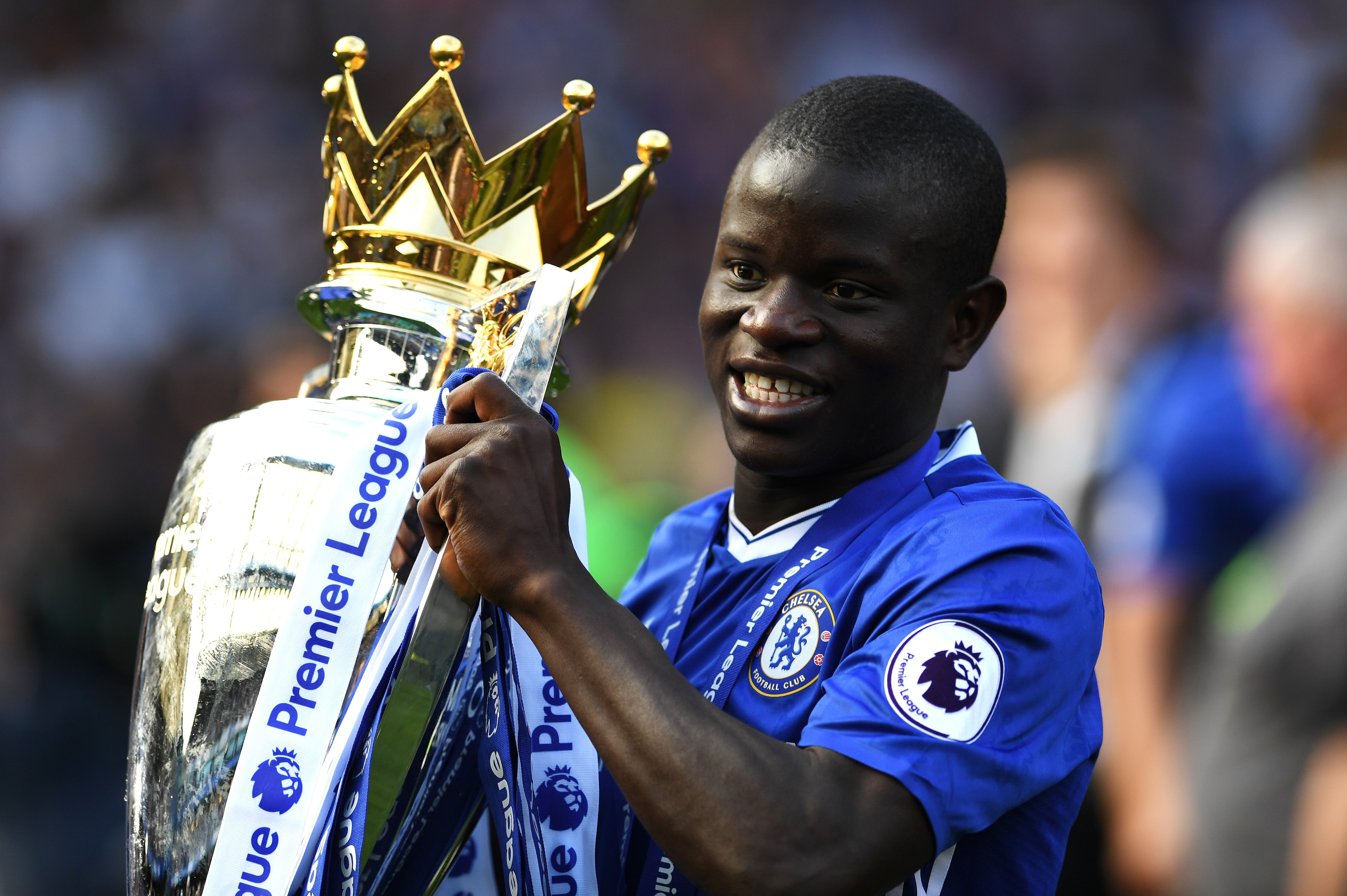 LONDON, ENGLAND - MAY 21: N'Golo Kante of Chelsea celebrates with the Premier League Trophy after the Premier League match between Chelsea and Sunderland at Stamford Bridge on May 21, 2017 in London, England.  (Photo by Shaun Botterill/Getty Images)