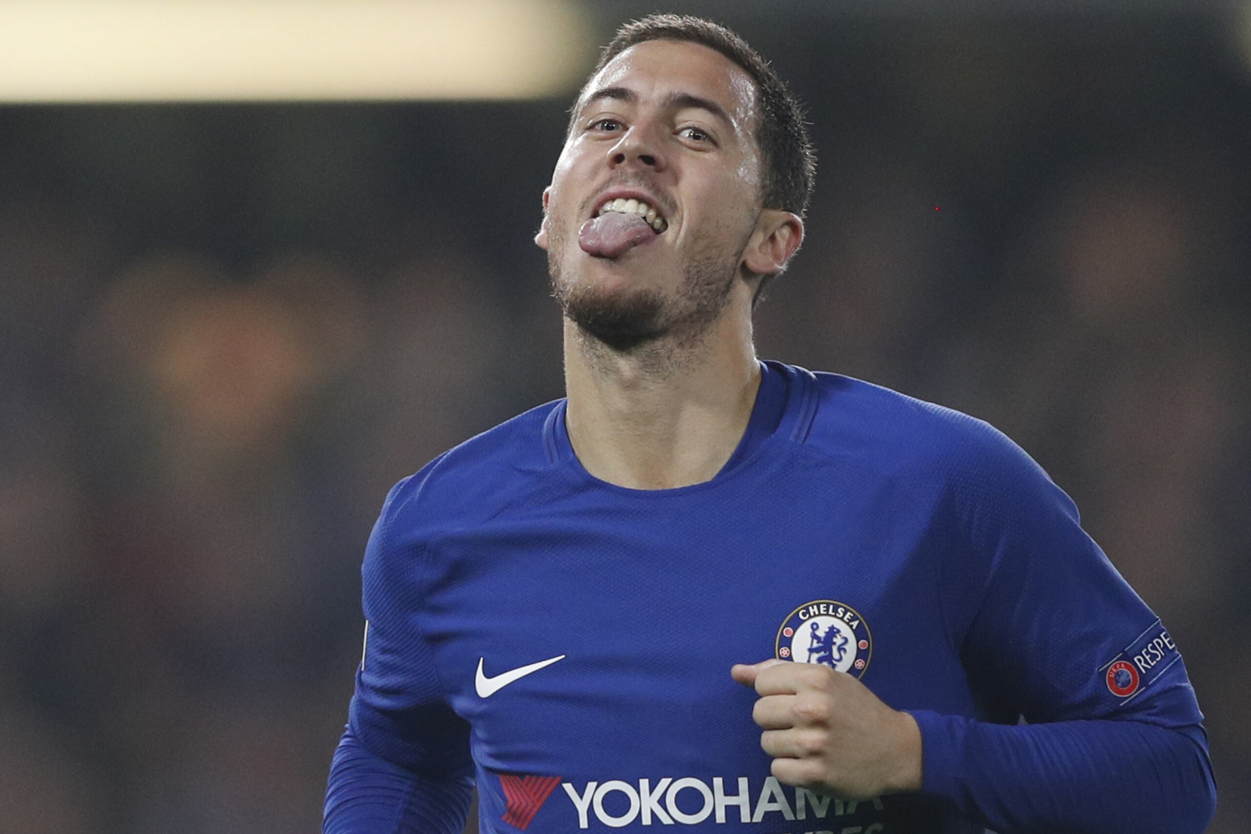 Chelsea's Belgian midfielder Eden Hazard celebrates after scoring during a UEFA Champions league group stage football match between Chelsea and Roma at Stamford Bridge in London on October 18, 2017. / AFP PHOTO / Adrian DENNIS (Photo credit should Chelsea's Belgian midfielder Eden Hazard celebrates after scoring during a UEFA Champions league group stage football match between Chelsea and Roma at Stamford Bridge in London on October 18, 2017. / AFP PHOTO / Adrian DENNIS (Photo credit should