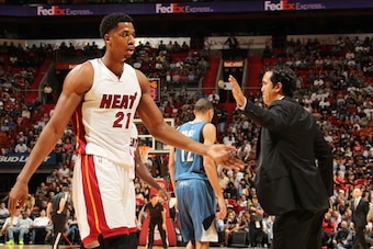 MIAMI, FL - NOVEMBER 17:  Hassan Whiteside #21 of the Miami Heat shakes hands with head coach Erik Spoelstra of the Miami Heat during the game against the Minnesota Timberwolves on November 17, 2015 at American Airlines Arena in Miami, Florida. NOTE TO US