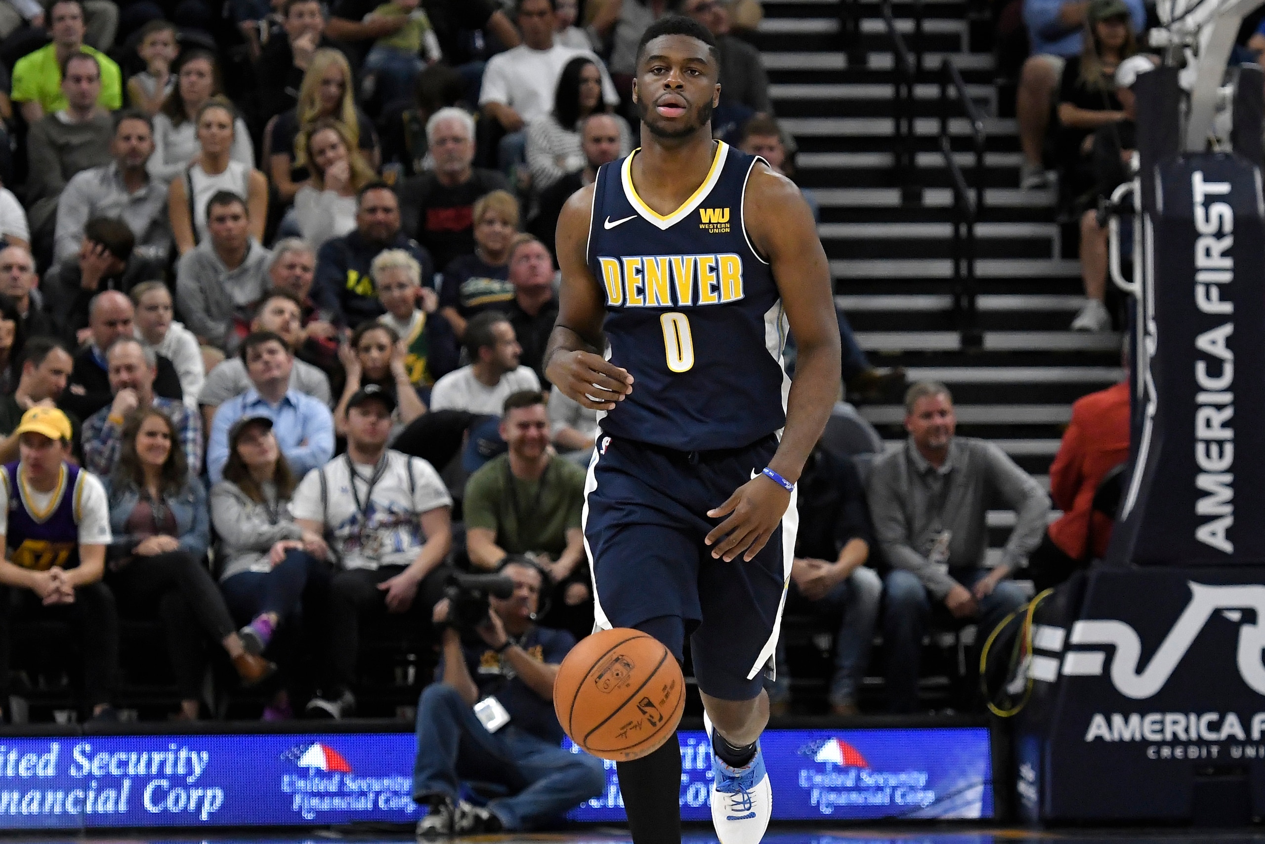 SALT LAKE CITY, UT - OCTOBER 18: Emmanuel Mudiay #0 of the Denver Nuggets brings the ball up court against the Utah Jazz at Vivint Smart Home Arena on October 18, 2017 in Salt Lake City, Utah. NOTE TO USER: User expressly acknowledges and agrees that, by SALT LAKE CITY, UT - OCTOBER 18: Emmanuel Mudiay #0 of the Denver Nuggets brings the ball up court against the Utah Jazz at Vivint Smart Home Arena on October 18, 2017 in Salt Lake City, Utah. NOTE TO USER: User expressly acknowledges and agrees that, by