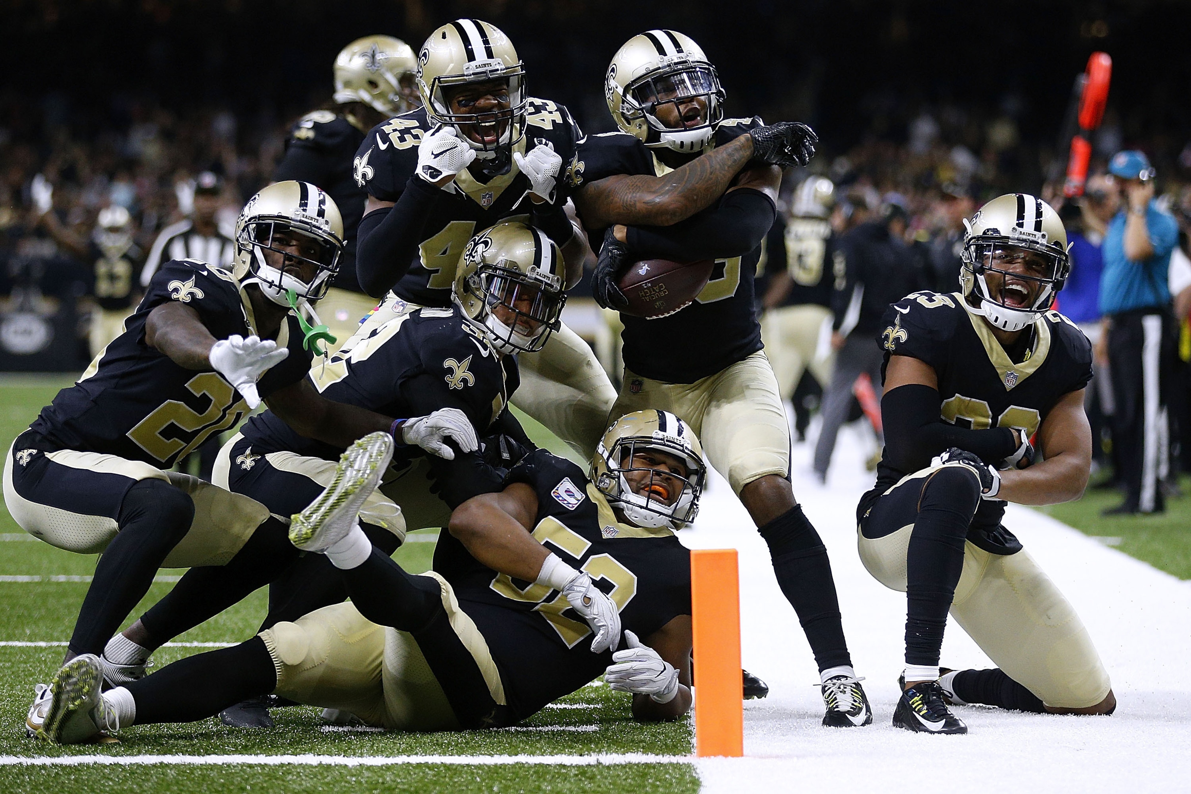 NEW ORLEANS, LA - OCTOBER 15:  The New Orleans Saints defense celebrates during the second half of a game against the Detroit Lions at the Mercedes-Benz Superdome on October 15, 2017 in New Orleans, Louisiana.  (Photo by Jonathan Bachman/Getty Images)
