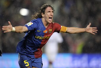 Barcelona's captain defender Carles Puyol celebrates after scoring during the Spanish league football match against Real Madrid at the Camp Nou stadium in Barcelona on December 13, 2008.       AFP PHOTO/PHILIPPE DESMAZES (Photo credit should read PHILIPPE
