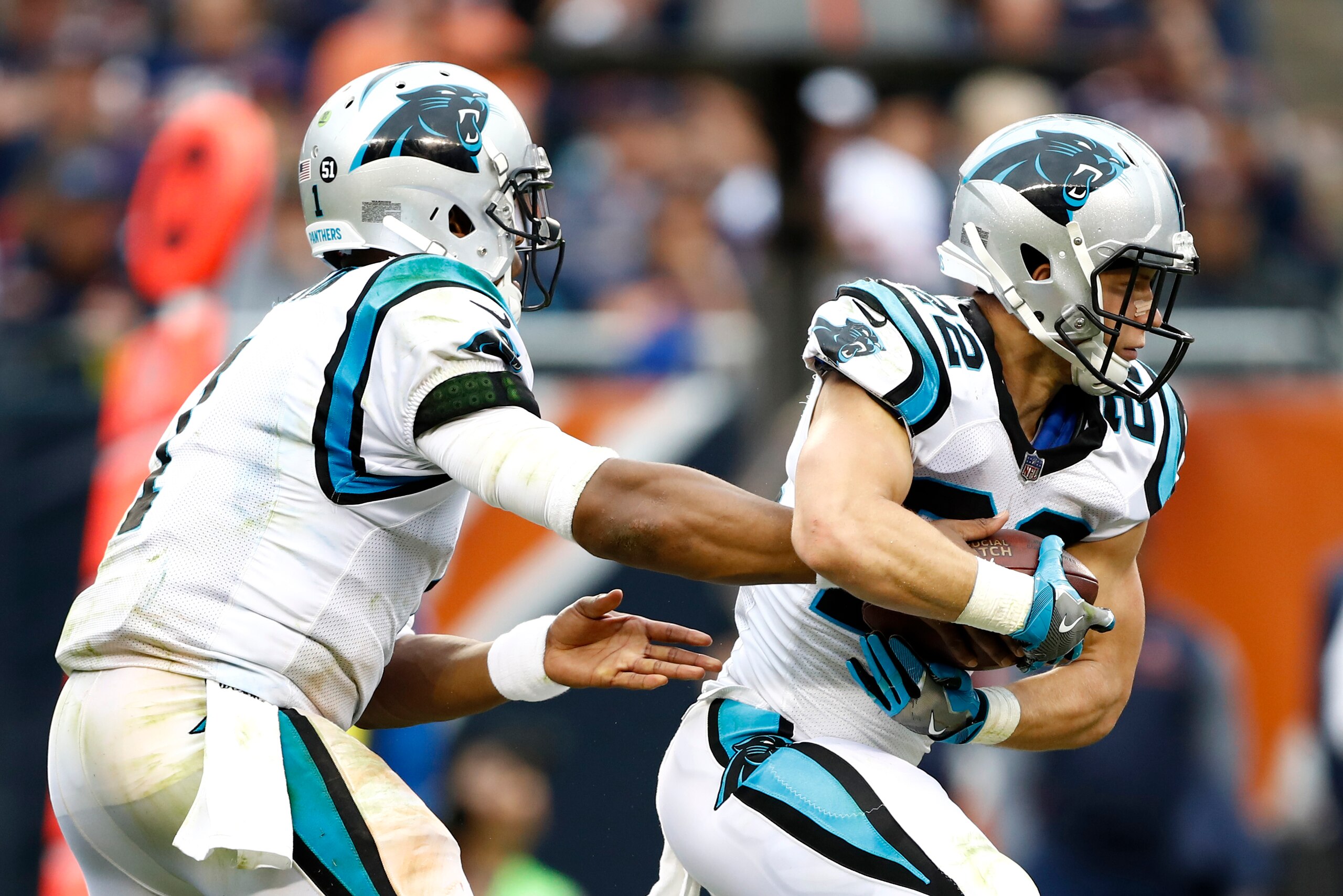 CHICAGO, IL - OCTOBER 22: Quarterback Cam Newton #1 of the Carolina Panthers hands the football off to Christian McCaffrey #22 in the second half against the Chicago Bears at Soldier Field on October 22, 2017 in Chicago, Illinois. The Chicago Bears def CHICAGO, IL - OCTOBER 22: Quarterback Cam Newton #1 of the Carolina Panthers hands the football off to Christian McCaffrey #22 in the second half against the Chicago Bears at Soldier Field on October 22, 2017 in Chicago, Illinois. The Chicago Bears def