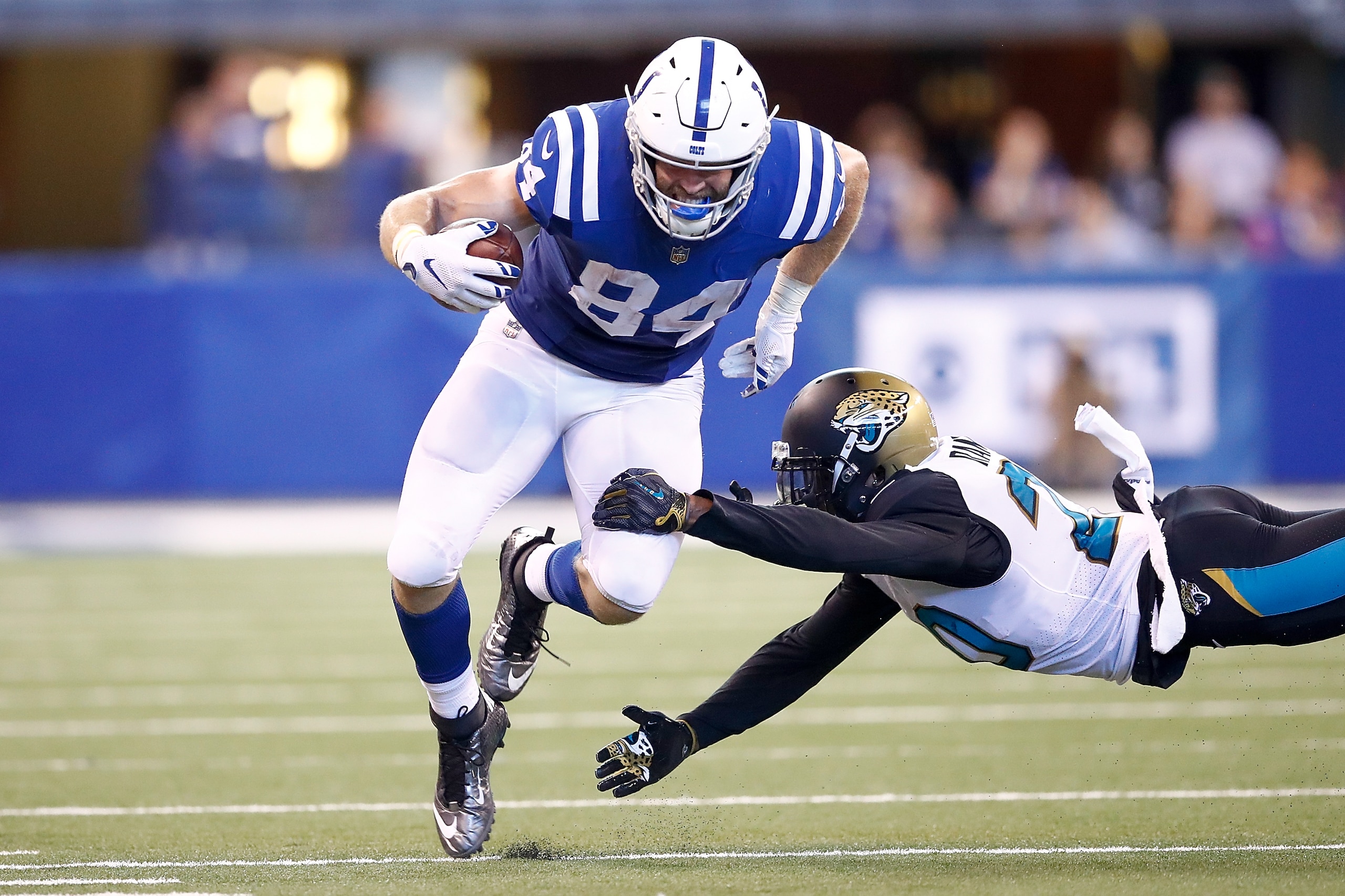INDIANAPOLIS, IN - OCTOBER 22: Jack Doyle #84 of the Indianapolis Colts breaks a tackle from Jalen Ramsey #20 of the Jacksonville Jaguars during the fourth quarter at Lucas Oil Stadium on October 22, 2017 in Indianapolis, Indiana. (Photo by Andy Lyons/G INDIANAPOLIS, IN - OCTOBER 22: Jack Doyle #84 of the Indianapolis Colts breaks a tackle from Jalen Ramsey #20 of the Jacksonville Jaguars during the fourth quarter at Lucas Oil Stadium on October 22, 2017 in Indianapolis, Indiana. (Photo by Andy Lyons/G