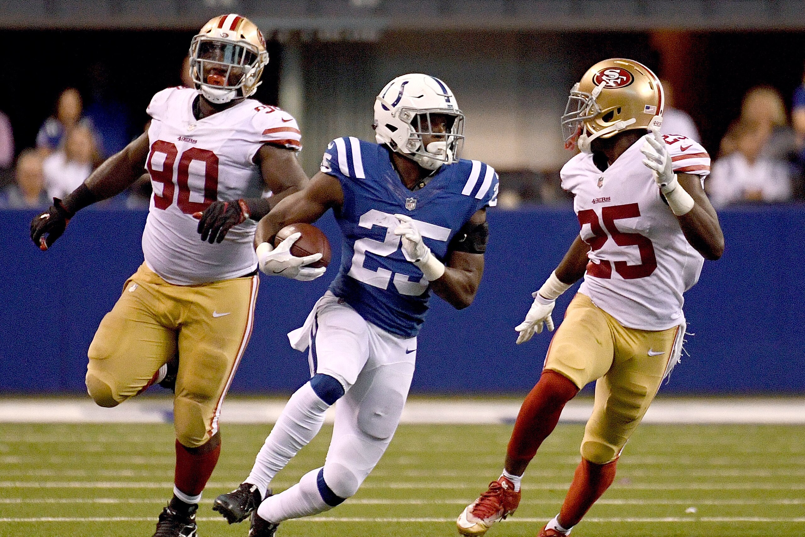 INDIANAPOLIS, IN - OCTOBER 08: Marlon Mack #25 of the Indianapolis Colts runs the ball downfield for a first down during overtime in the game between the Indianapolis Colts and the San Francisco 49ers at Lucas Oil Stadium on October 8, 2017 in Indianapoli