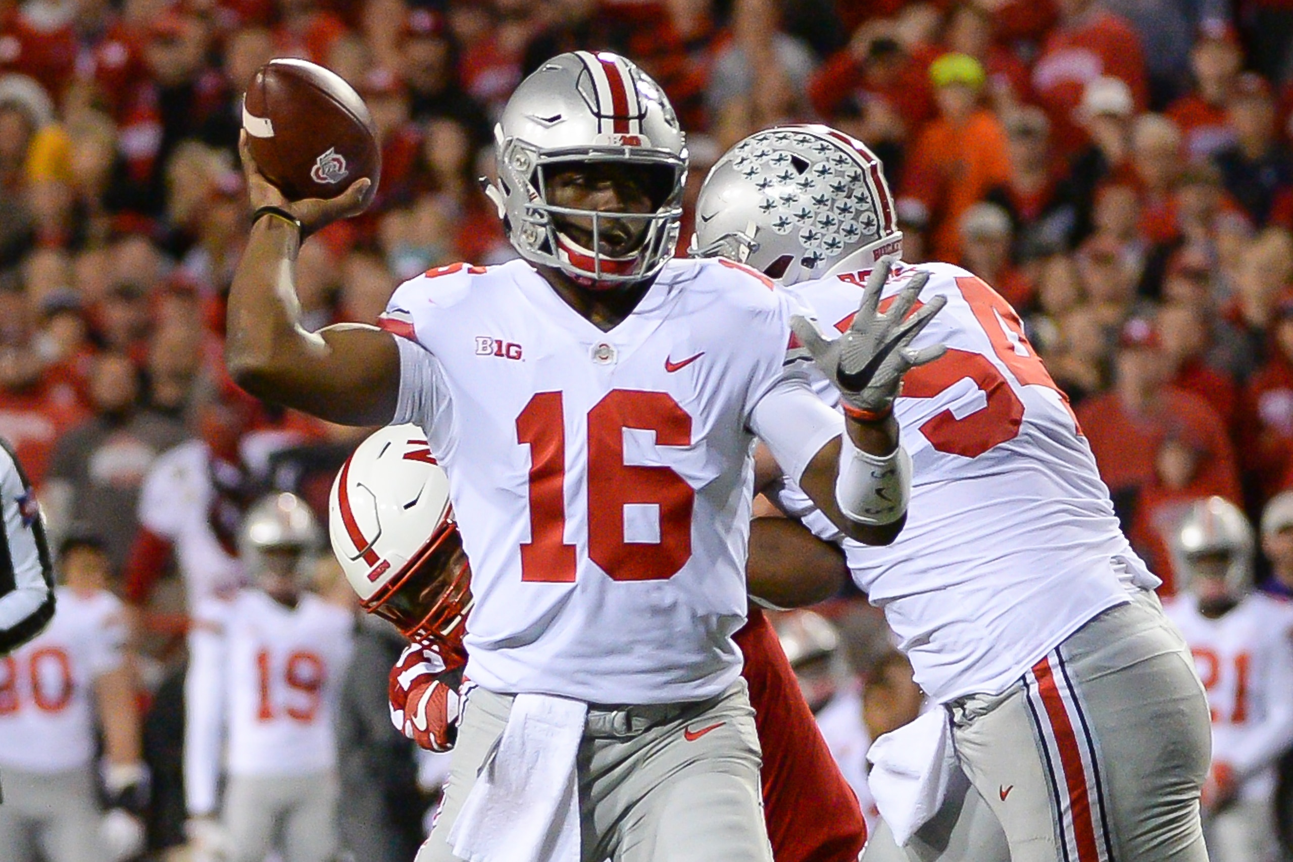 LINCOLN, NE - OCTOBER 14: Quarterback J.T. Barrett #16 of the Ohio State Buckeyes throws against the Nebraska Cornhuskers at Memorial Stadium on October 14, 2017 in Lincoln, Nebraska. (Photo by Steven Branscombe/Getty Images)