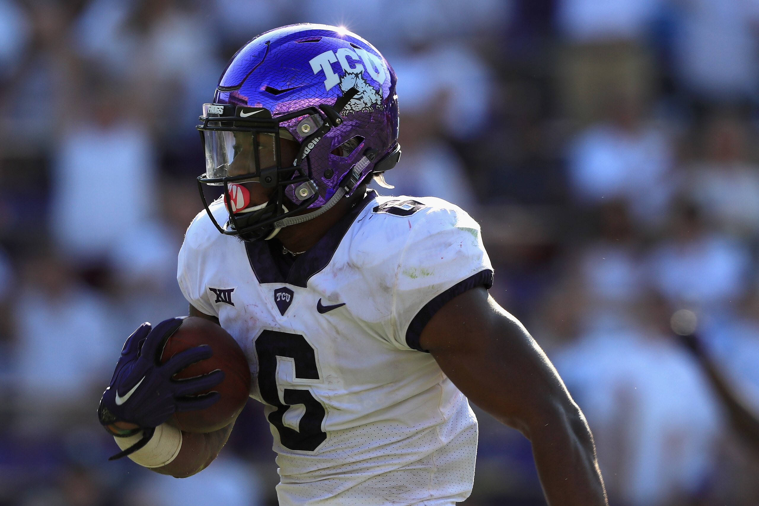 FORT WORTH, TX - SEPTEMBER 16:  Darius Anderson #6 of the TCU Horned Frogs runs the ball for a touchdown against the Southern Methodist Mustangs in the second half at Amon G. Carter Stadium on September 16, 2017 in Fort Worth, Texas.  (Photo by Ronald Mar