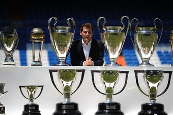 MADRID, SPAIN - JULY 13:  Iker Casillas poses behind trophies he has won during his career in Real Madrid after holding a press conference with Real  president Florentino Perez at the Santiago Bernabeu stadium to announce that he will be leaving Real Madr