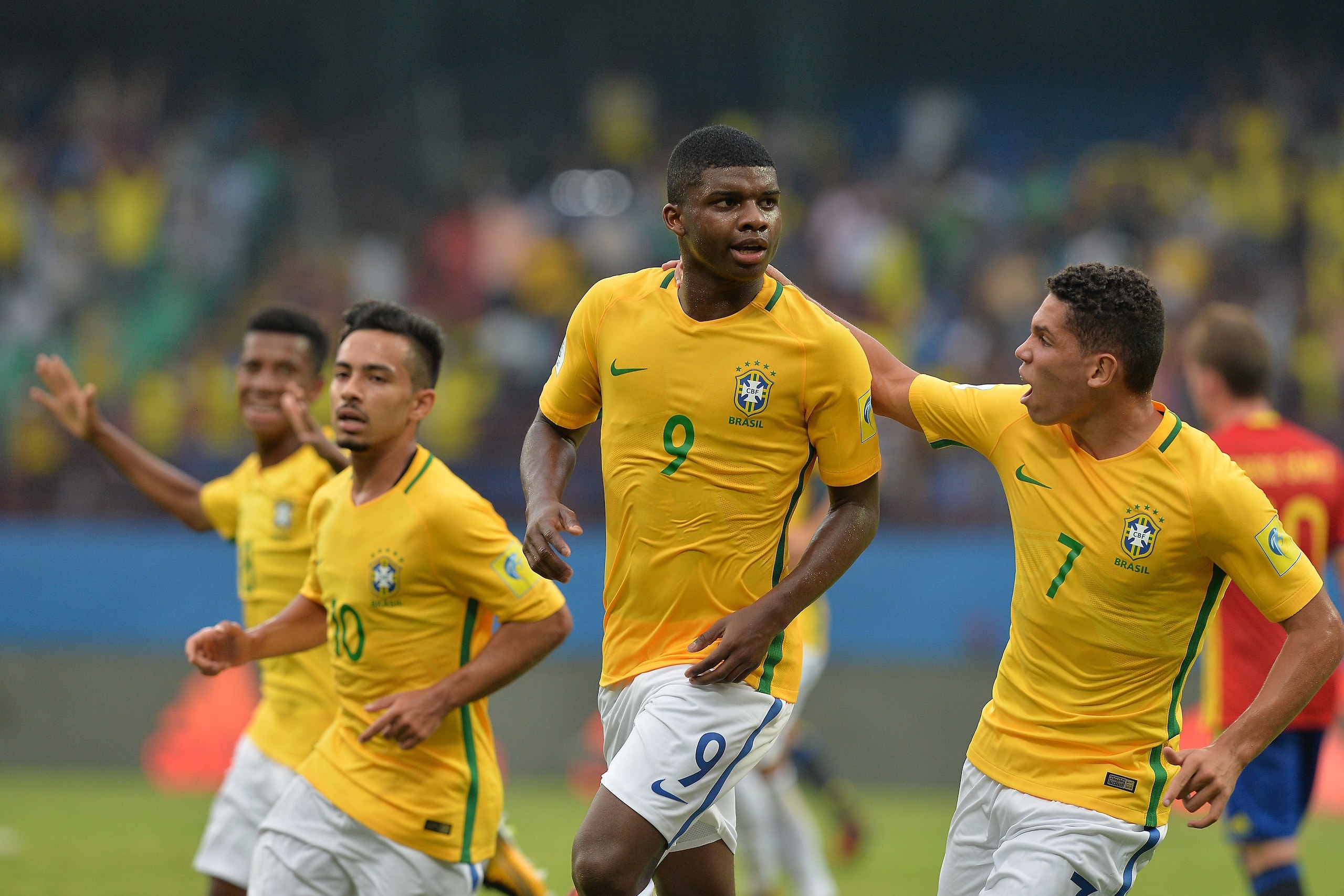 Lincoln (C) of Brazil runs along with his teammates to celebrate a goal against Spain during their group stage football match in the FIFA U-17 World Cup played at the Jawaharlal Nehru International Stadium in Kochi on October 7, 2017.
The FIFA U-17 Footba