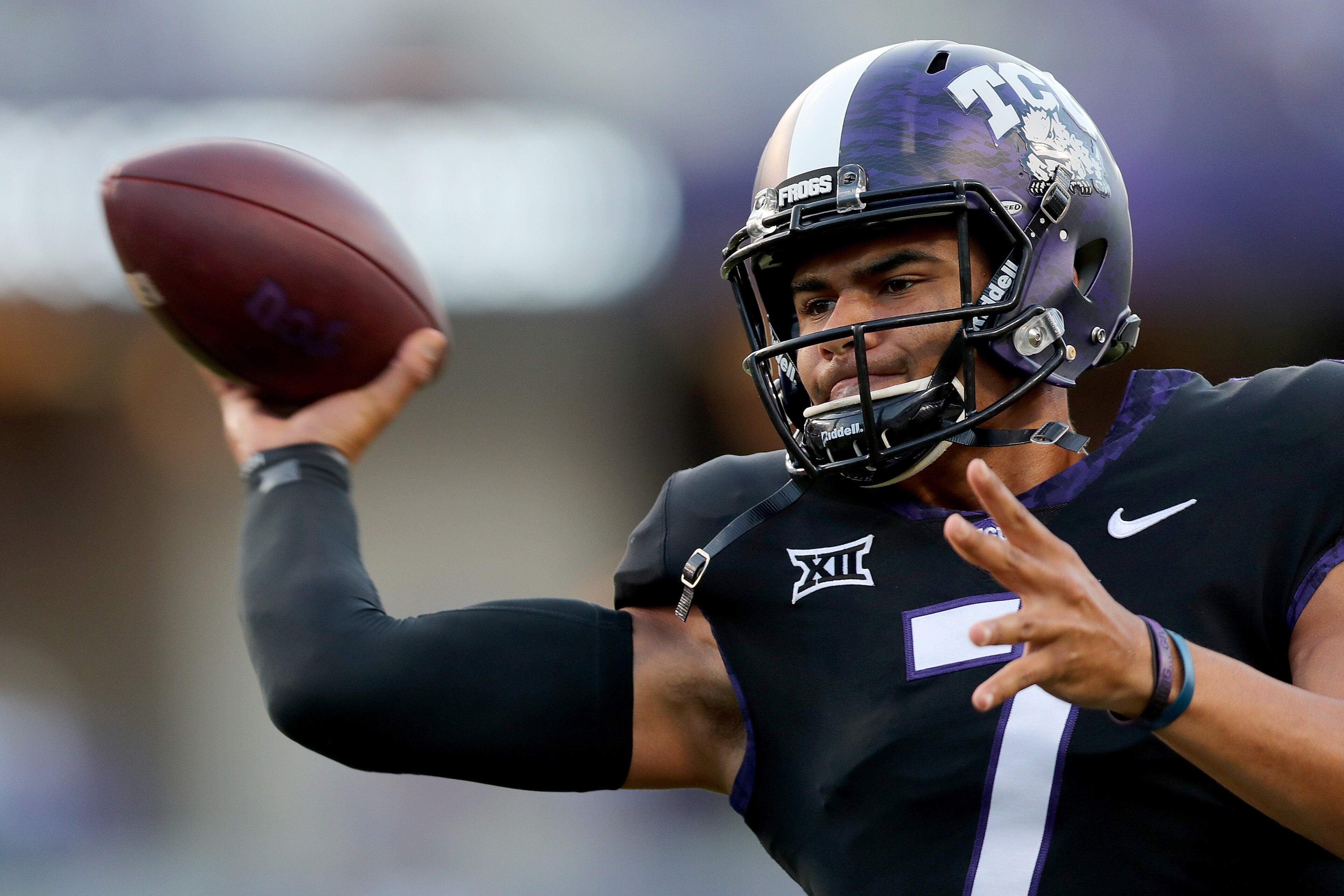 FORT WORTH, TX - OCTOBER 21:  Kenny Hill #7 of the TCU Horned Frogs works through pregame warm up before taking on the Kansas Jayhawks at Amon G. Carter Stadium on October 21, 2017 in Fort Worth, Texas.  (Photo by Tom Pennington/Getty Images)