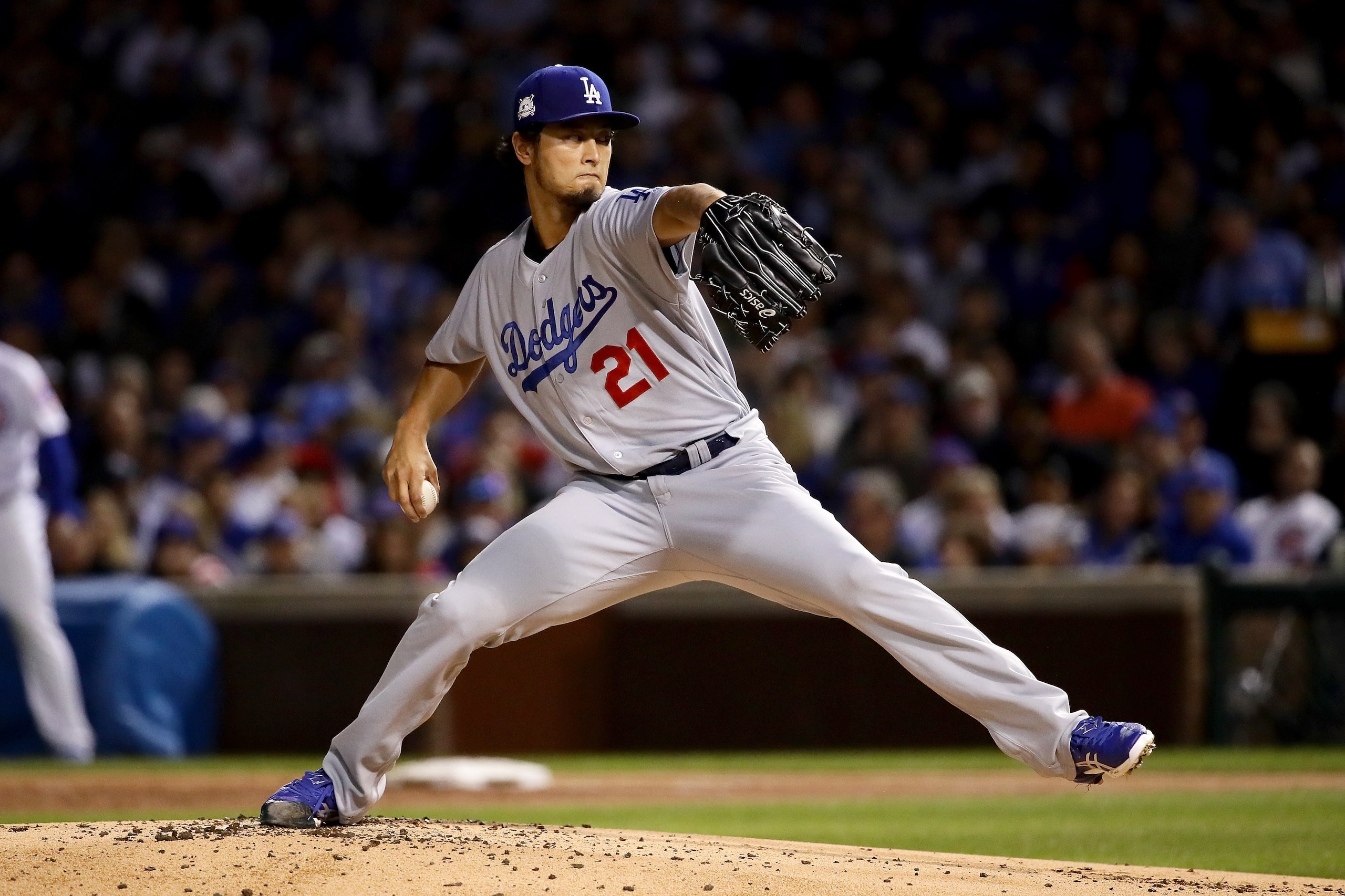 CHICAGO, IL - OCTOBER 17:  Yu Darvish #21 of the Los Angeles Dodgers pitches in the first inning against the Chicago Cubs during game three of the National League Championship Series at Wrigley Field on October 17, 2017 in Chicago, Illinois.  (Photo by Jo