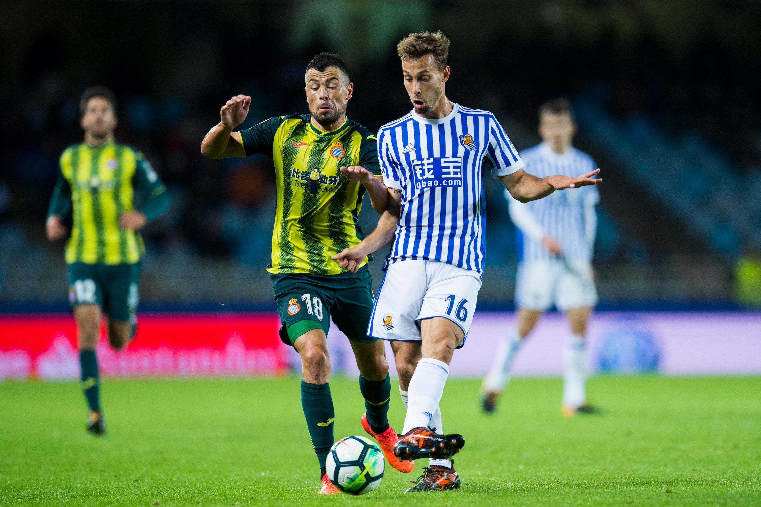 SAN SEBASTIAN, SPAIN - OCTOBER 23: Javi Fuego of RCD Espanyol duels for the ball with Sergio Canales of Real Sociedad during the La Liga match between Real Sociedad de Futbol and RCD Espanyol at Estadio Anoeta on October 23, 2017 in San Sebastian, Spain. 