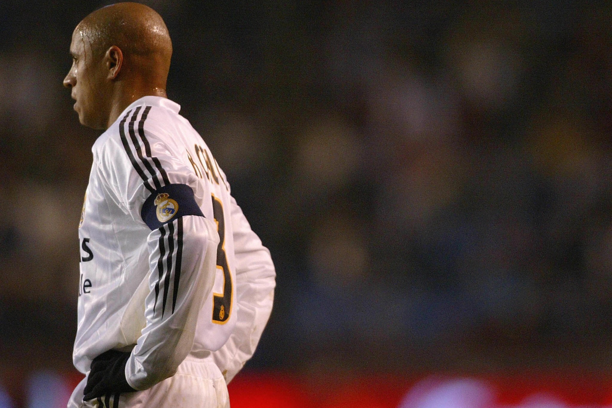CORUNA, SPAIN: Real Madrid Brazilian Roberto Carlos vies in a Spanish first league football match against Deportivo Coruna at Riazor stadium, in Coruna, 26 February 2005. (Photo credit should read MIGUEL RIOPA/AFP/Getty Images) CORUNA, SPAIN: Real Madrid Brazilian Roberto Carlos vies in a Spanish first league football match against Deportivo Coruna at Riazor stadium, in Coruna, 26 February 2005. (Photo credit should read MIGUEL RIOPA/AFP/Getty Images)