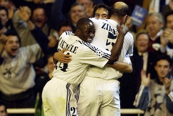 MADRID - APRIL 8:  Raul of Real Madrid celebrates scoring the second goal with team-mates Claude Makelele and Zinedine Zidane during the UEFA Champions League quarter-final first leg match between Real Madrid and Manchester United held on April 8, 2003 at