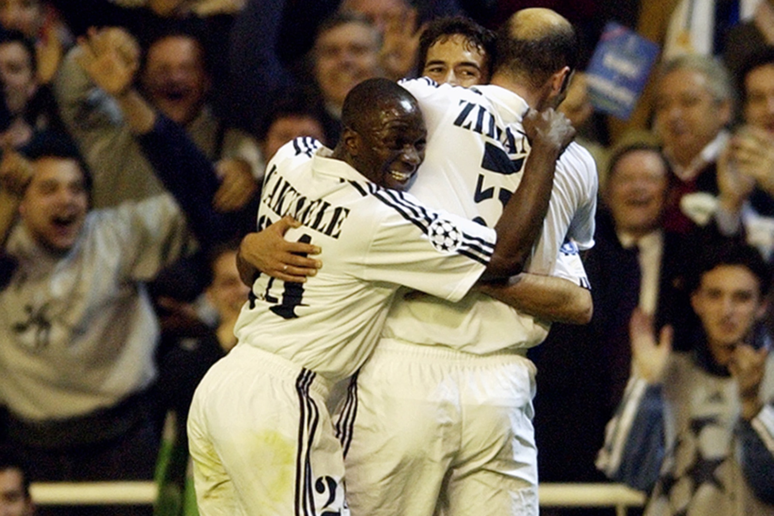 MADRID - APRIL 8: Raul of Real Madrid celebrates scoring the second goal with team-mates Claude Makelele and Zinedine Zidane during the UEFA Champions League quarter-final first leg match between Real Madrid and Manchester United held on April 8, 2003 at MADRID - APRIL 8: Raul of Real Madrid celebrates scoring the second goal with team-mates Claude Makelele and Zinedine Zidane during the UEFA Champions League quarter-final first leg match between Real Madrid and Manchester United held on April 8, 2003 at