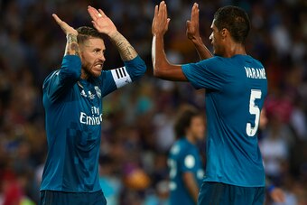 BARCELONA, SPAIN - AUGUST 13:  Sergio Ramos of Real Madrid celebrates with his teammate Raphael Varane after the end the Supercopa de Espana Supercopa Final 1st Leg match between FC Barcelona and Real Madrid at Camp Nou on August 13, 2017 in Barcelona, Sp