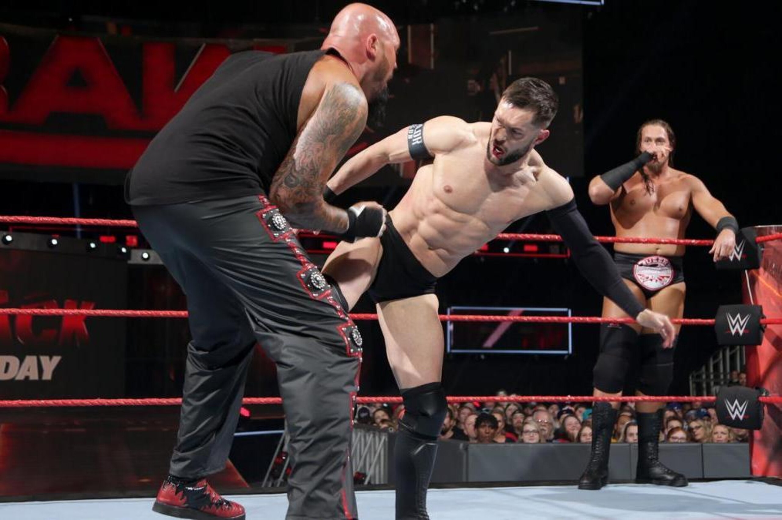 Finn Balor faces Luke Gallows in tag team action.