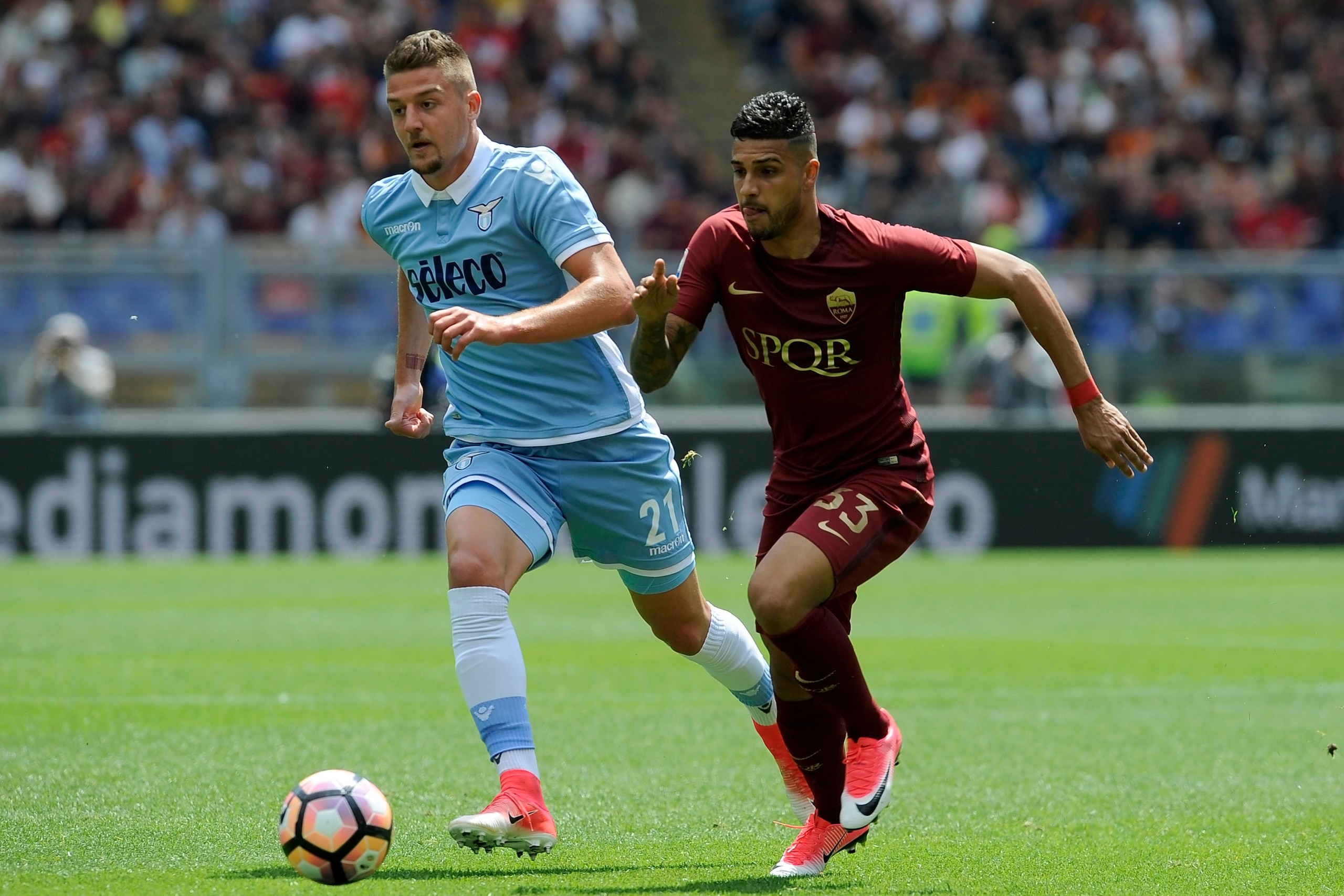 ROME, ROMA - APRIL 30:  Sergej Milinkovic Savic of SS Lazio compete for the ball with Emerson Palmieri of AS Roma during the Serie A match between AS Roma and SS Lazio at Stadio Olimpico on April 30, 2017 in Rome, Italy.  (Photo by Marco Rosi/Getty Images