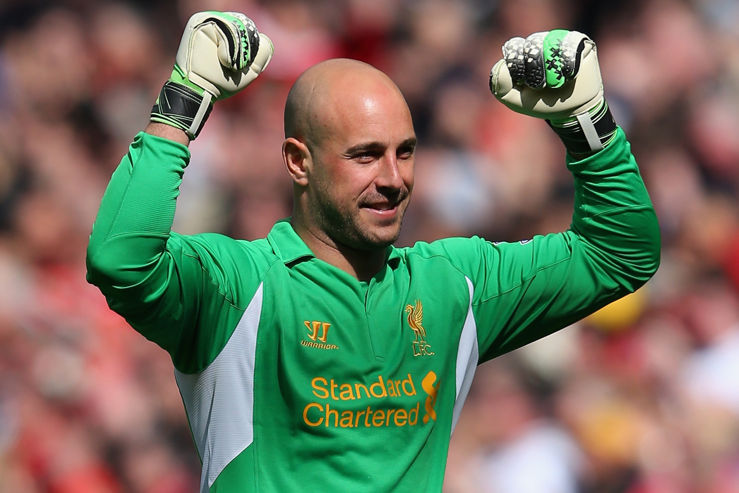 LIVERPOOL, ENGLAND - MAY 19:   Pepe Reina of Liverpool celebrates the opening goal during the Barclays Premier League match between Liverpool and Queens Park Rangers at Anfield on May 19, 2013 in Liverpool, England.  (Photo by Julian Finney/Getty Images)
