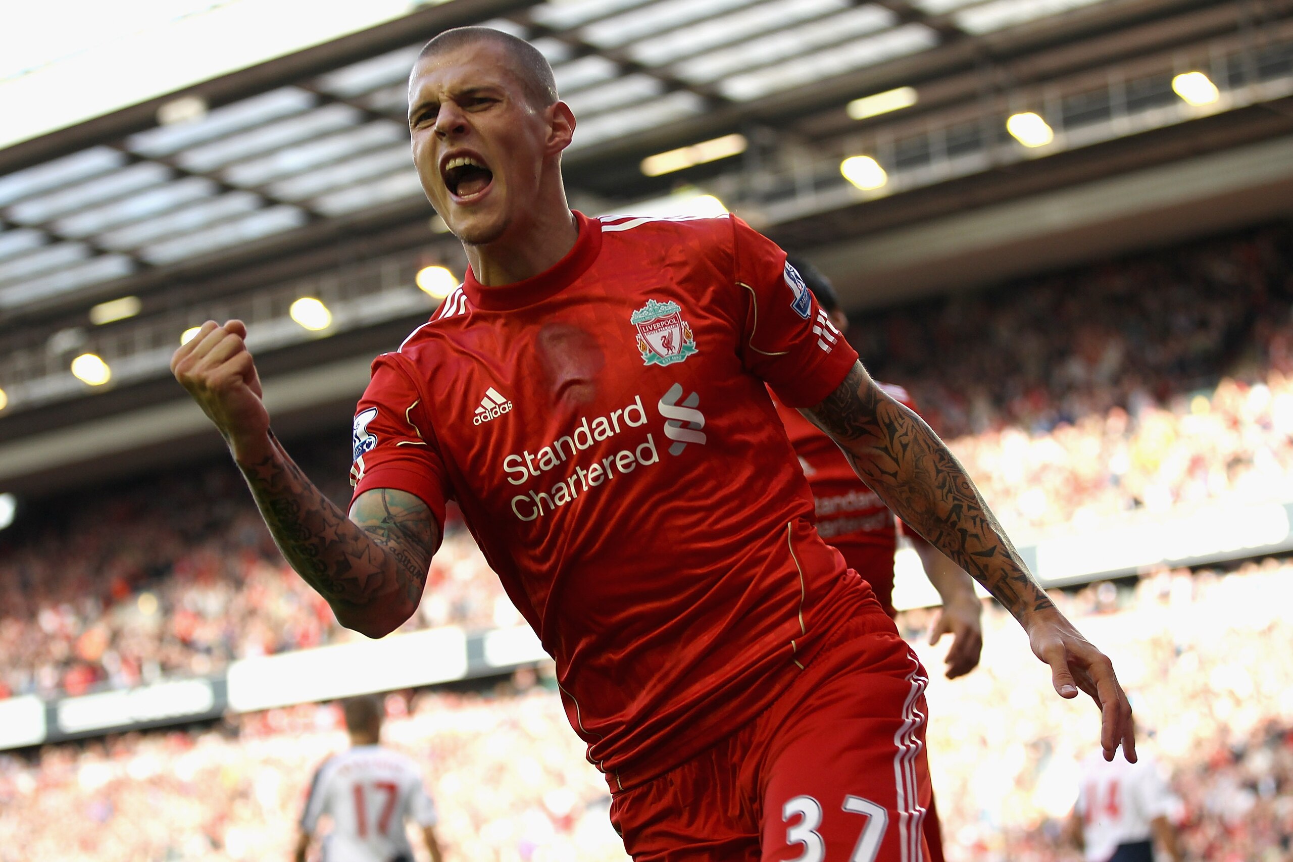 LIVERPOOL, ENGLAND - AUGUST 27:  Martin Skrtel of Liverpool celebrates scoring his side's second goal during the Barclays Premier League match between Liverpool and Bolton Wanderers at Anfield on August 27, 2011 in Liverpool, England.  (Photo by Clive Bru