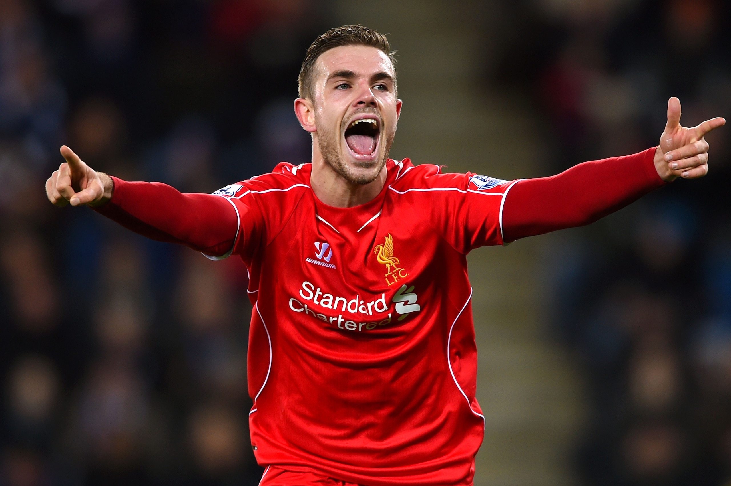 LEICESTER, ENGLAND - DECEMBER 02:  Jordan Henderson of Liverpool celebrates after scoring his team's third goal during the Barclays Premier League match between Leicester City and Liverpool at The King Power Stadium on December 2, 2014 in Leicester, Engla