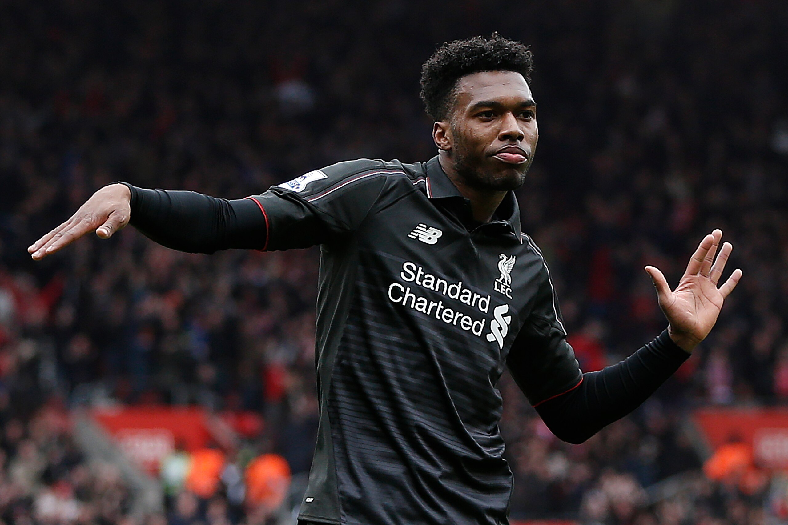 Liverpool's English striker Daniel Sturridge dances as he celebrates scoring his team's second goal during the English Premier League football match between Southampton and Liverpool at St Mary's Stadium in Southampton, southern England on March 20, 2016.