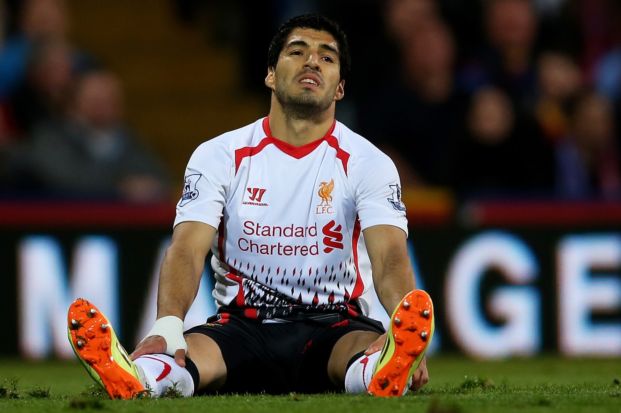 LONDON, ENGLAND - MAY 05:  A dejected Luis Suarez of Liverpool reacts during the Barclays Premier League match between Crystal Palace and Liverpool at Selhurst Park on May 5, 2014 in London, England.  (Photo by Clive Rose/Getty Images)